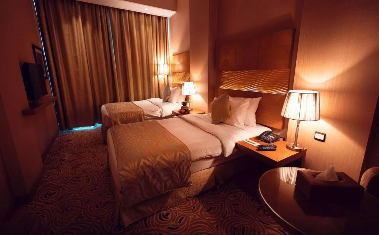 Bed in Coral Baghdad Hotel