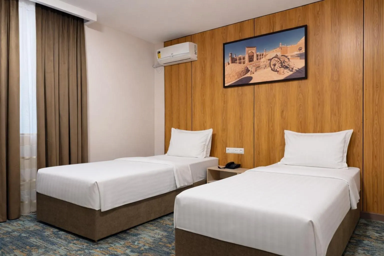 Bed in Musafir Hotel