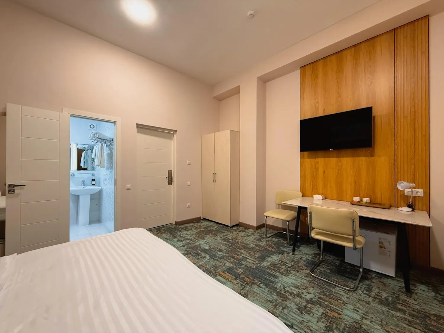 Bed in Musafir Hotel