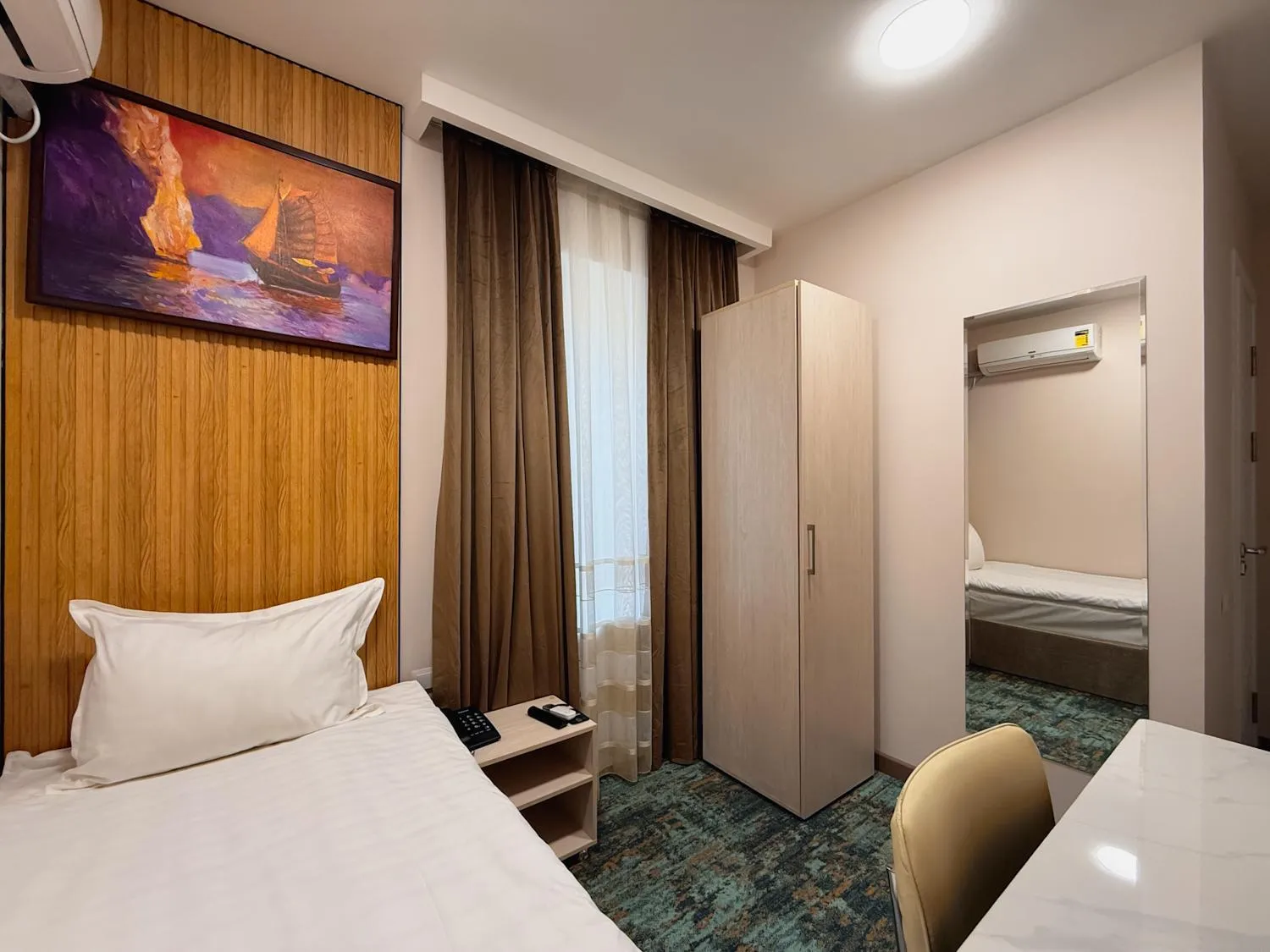 Bed in Musafir Hotel