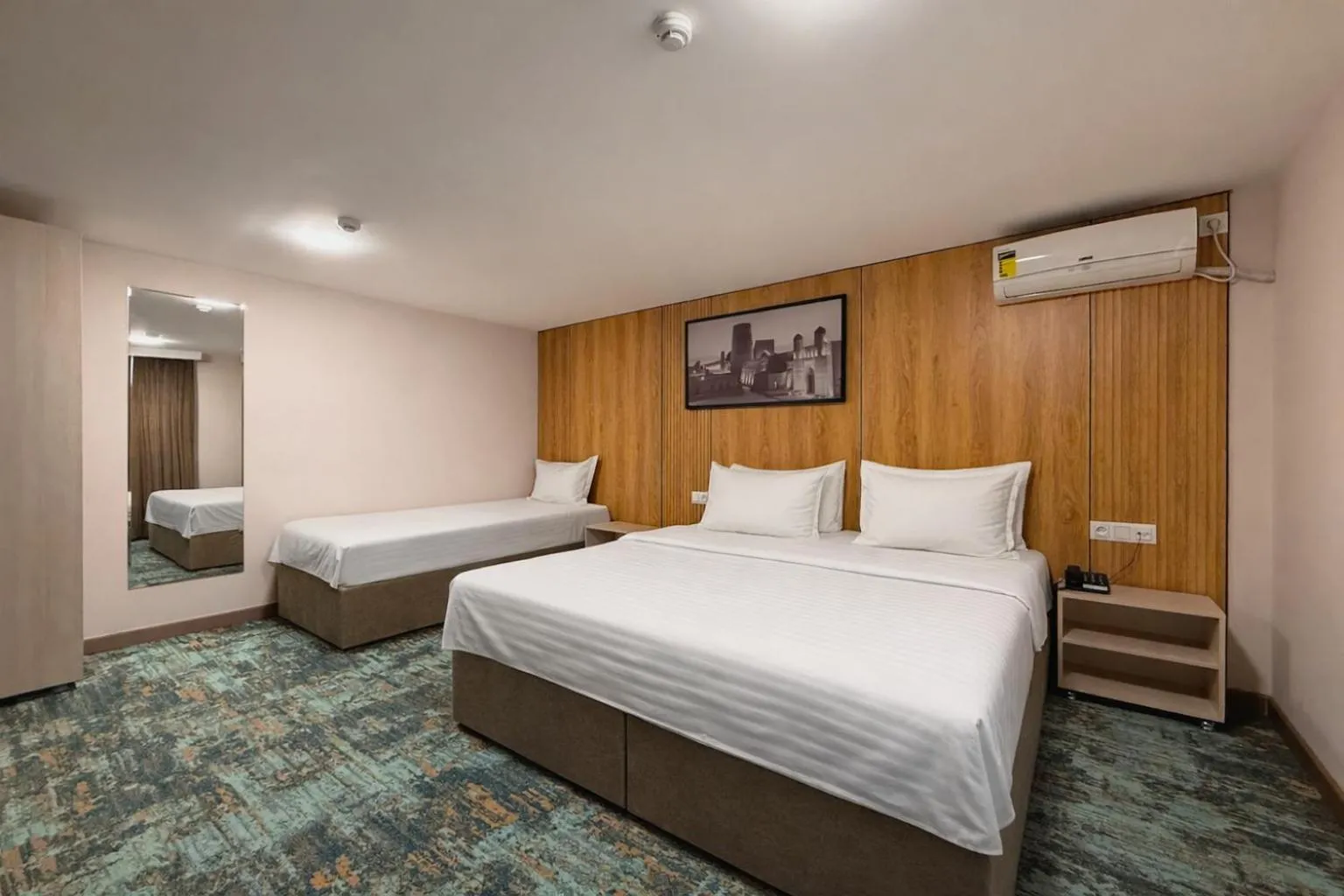 Bed in Musafir Hotel