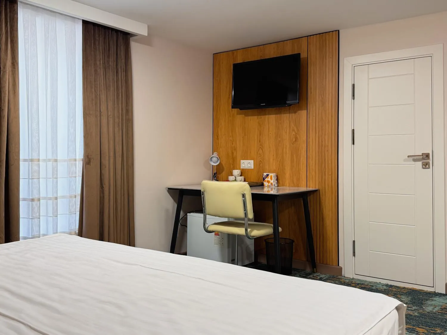 Bed in Musafir Hotel