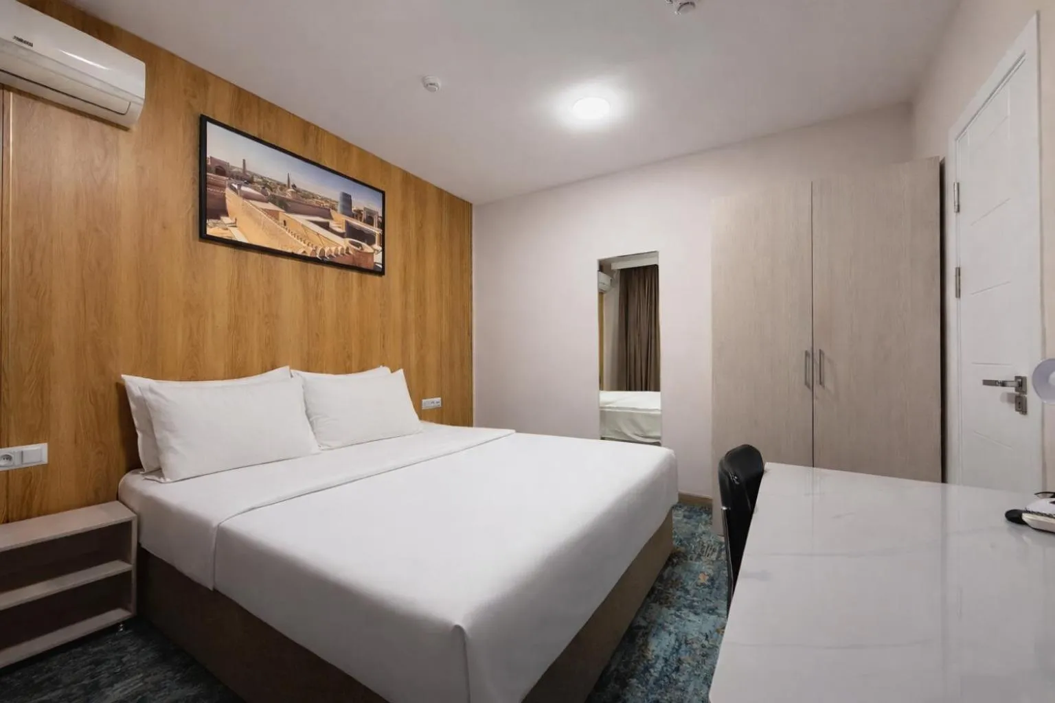 Bed in Musafir Hotel