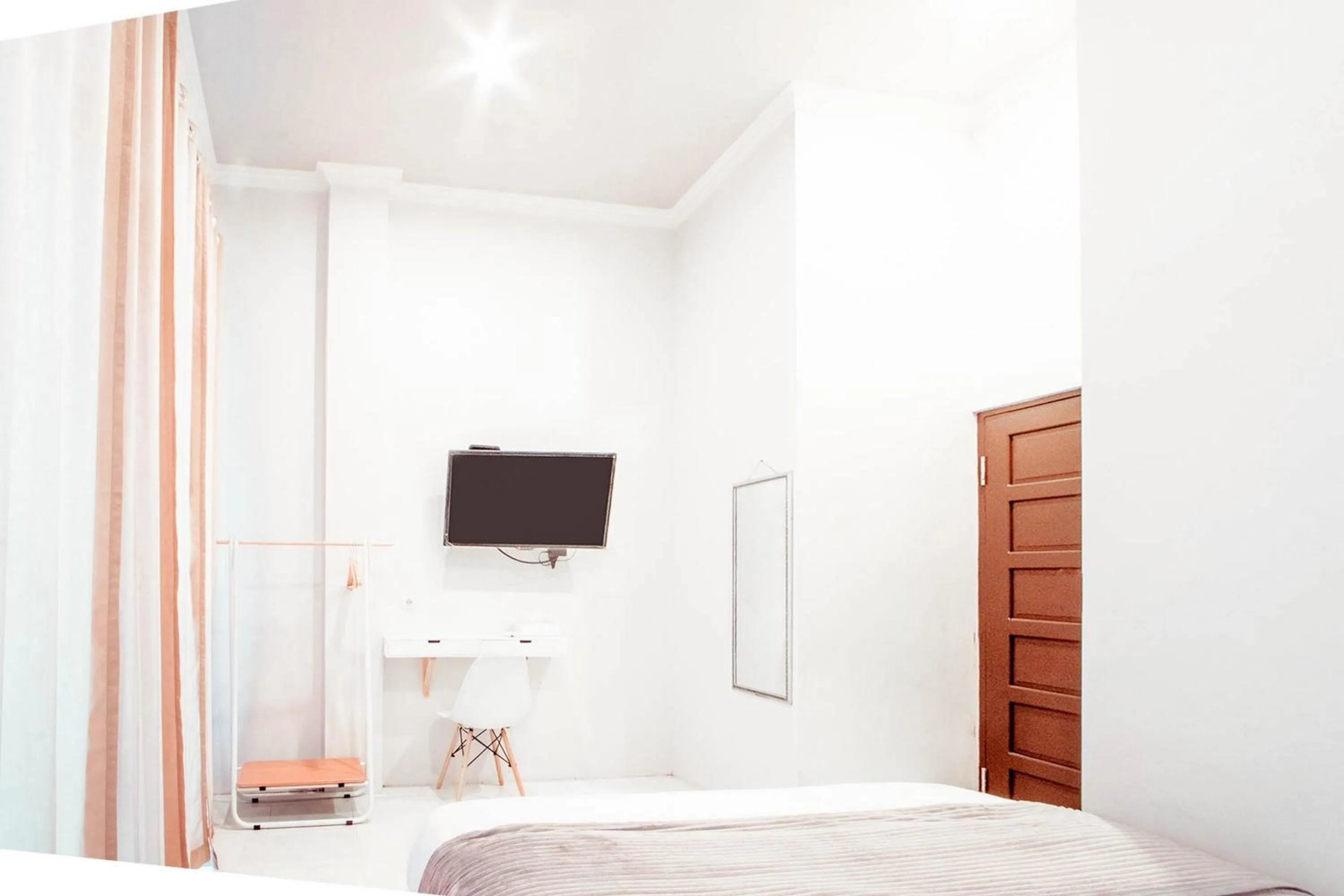 Bed in Krisan Guest House Syariah Banjarbaru Mitra RedDoorz