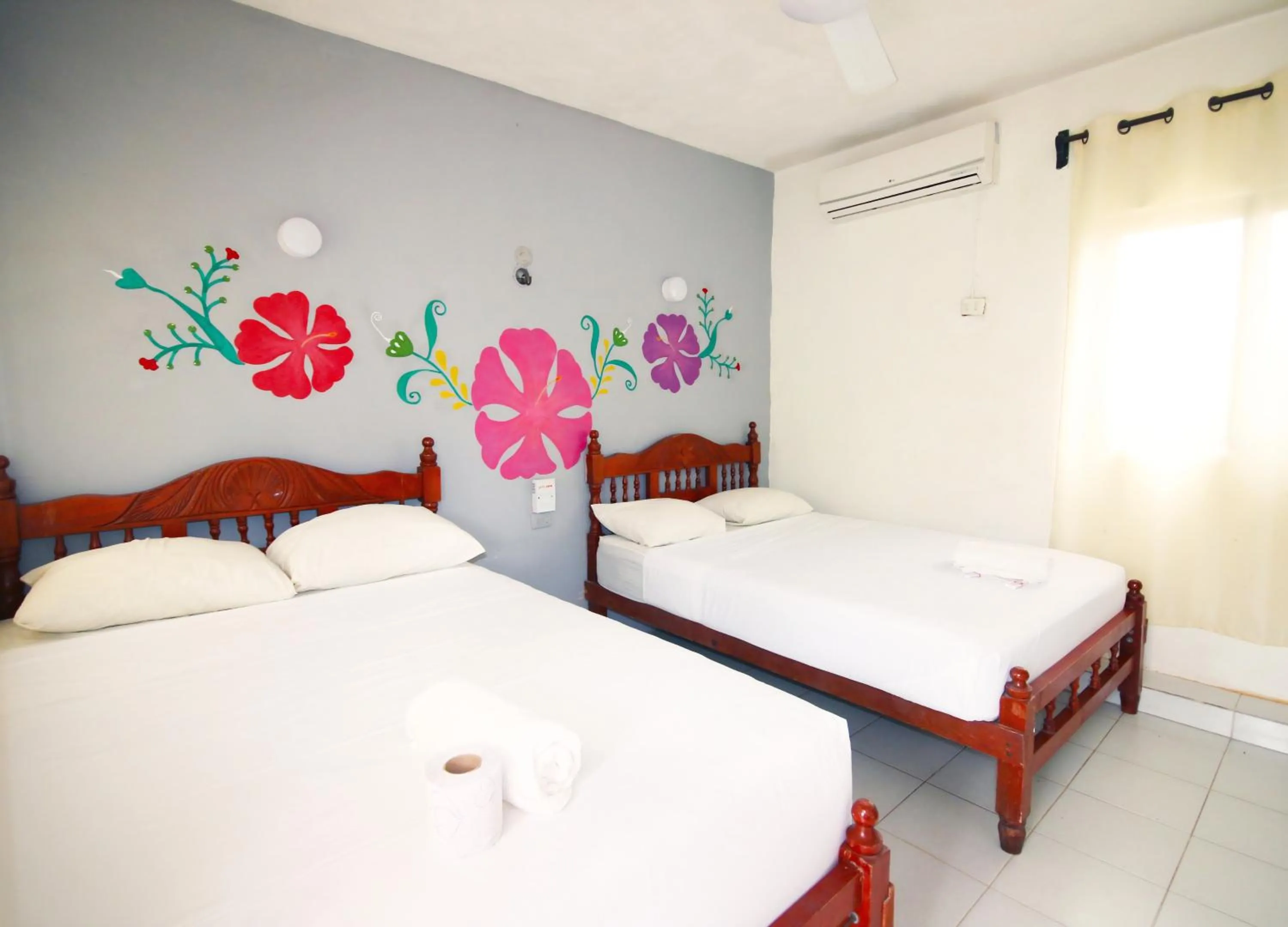 Bed in Hotel Los Arcos Holbox
