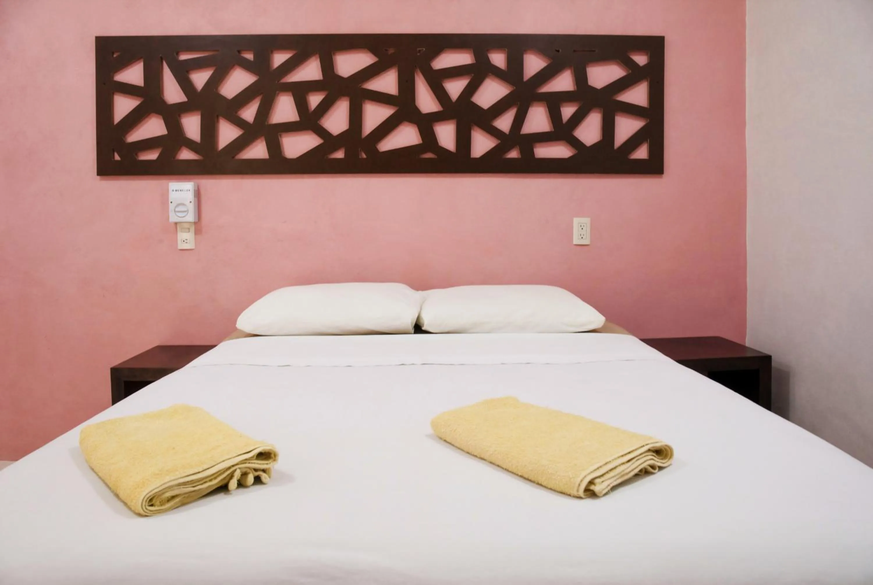Bed in Hotel Los Arcos Holbox