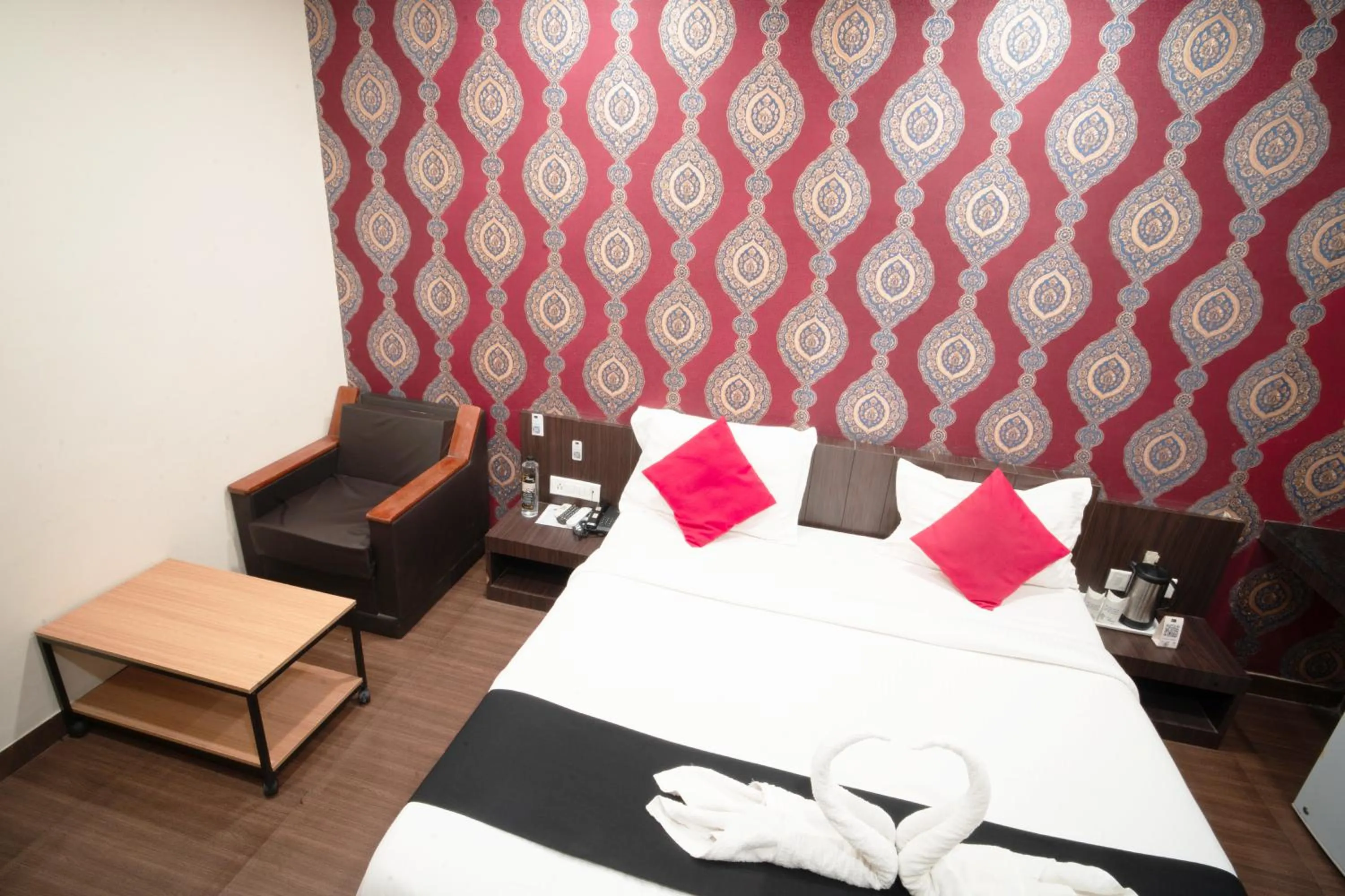 Bed in Hotel Flowers Inn