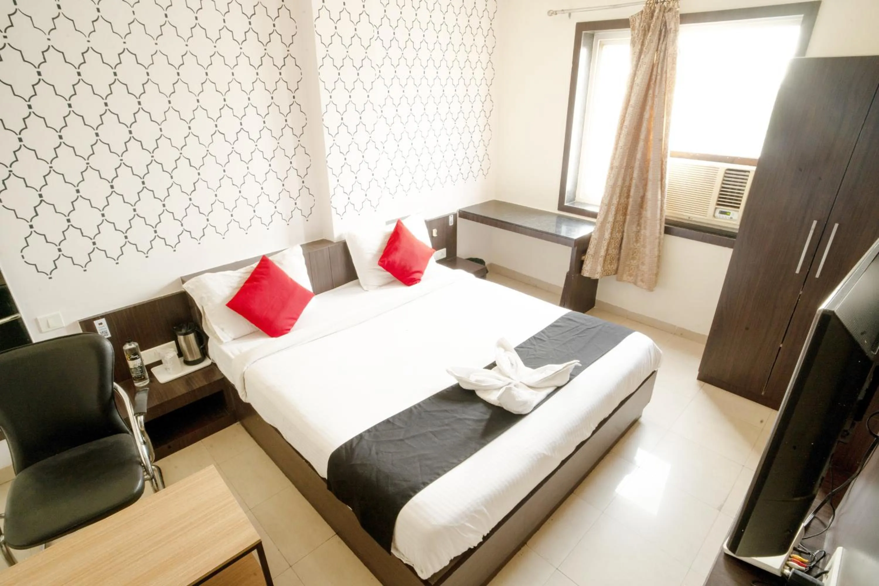 Bed in Hotel Flowers Inn