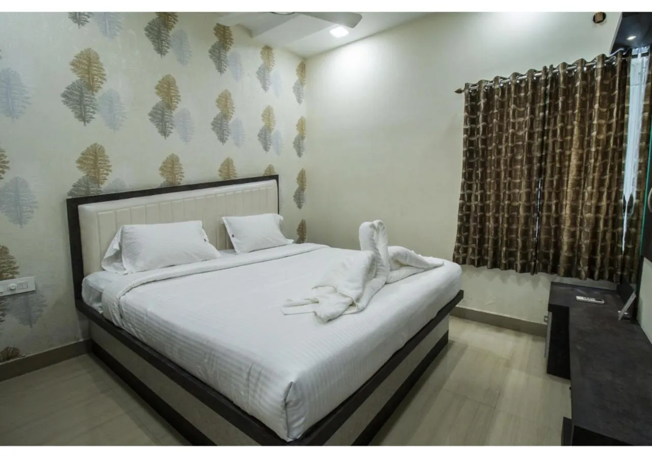 Bed in SR BOUTIQUEE STAY