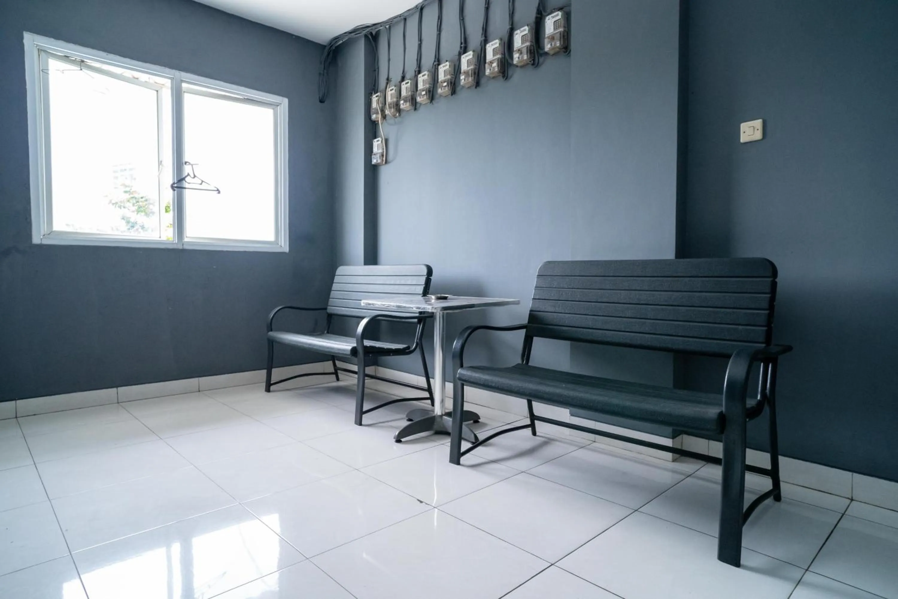 Seating area in Living Kost Syariah At Alam Sutera RedPartner