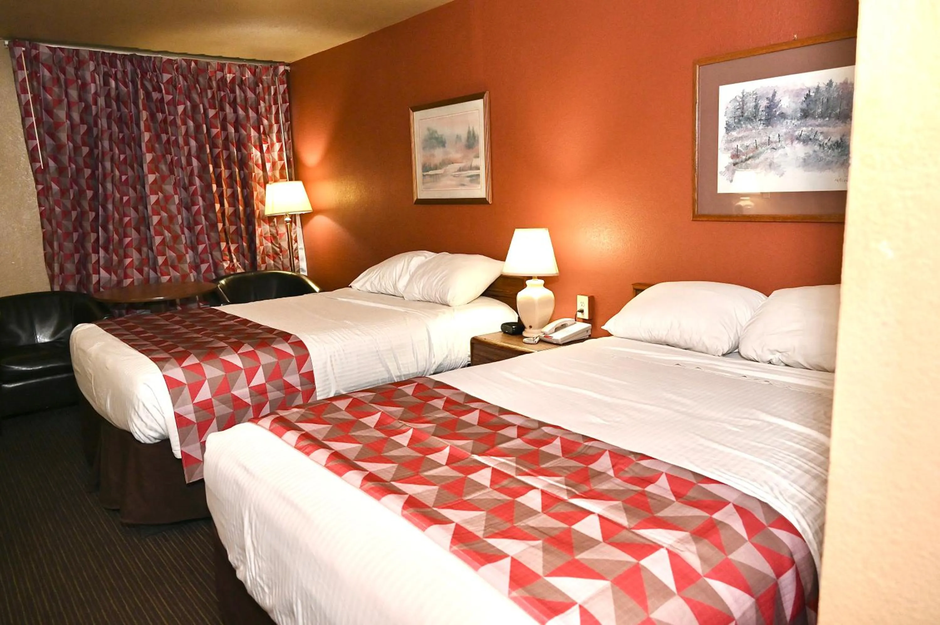 Bed in Fortune Inn & Suites