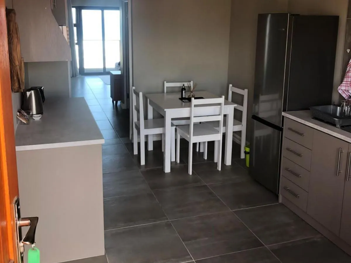 Kitchen or kitchenette in White Sands Self-catering units