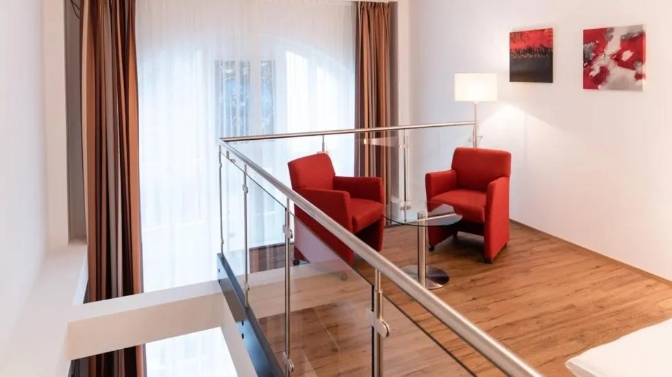 Seating area in Central City Hotel Rochat