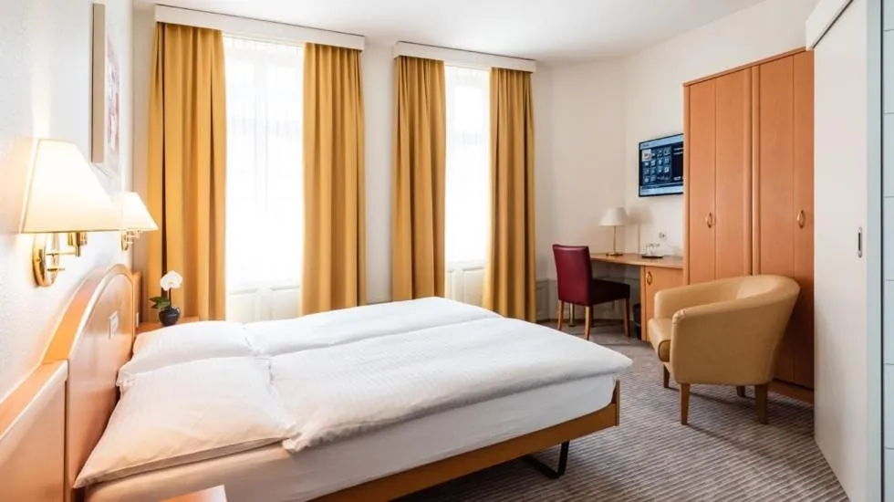 Photo of the whole room, Bed in Central City Hotel Rochat