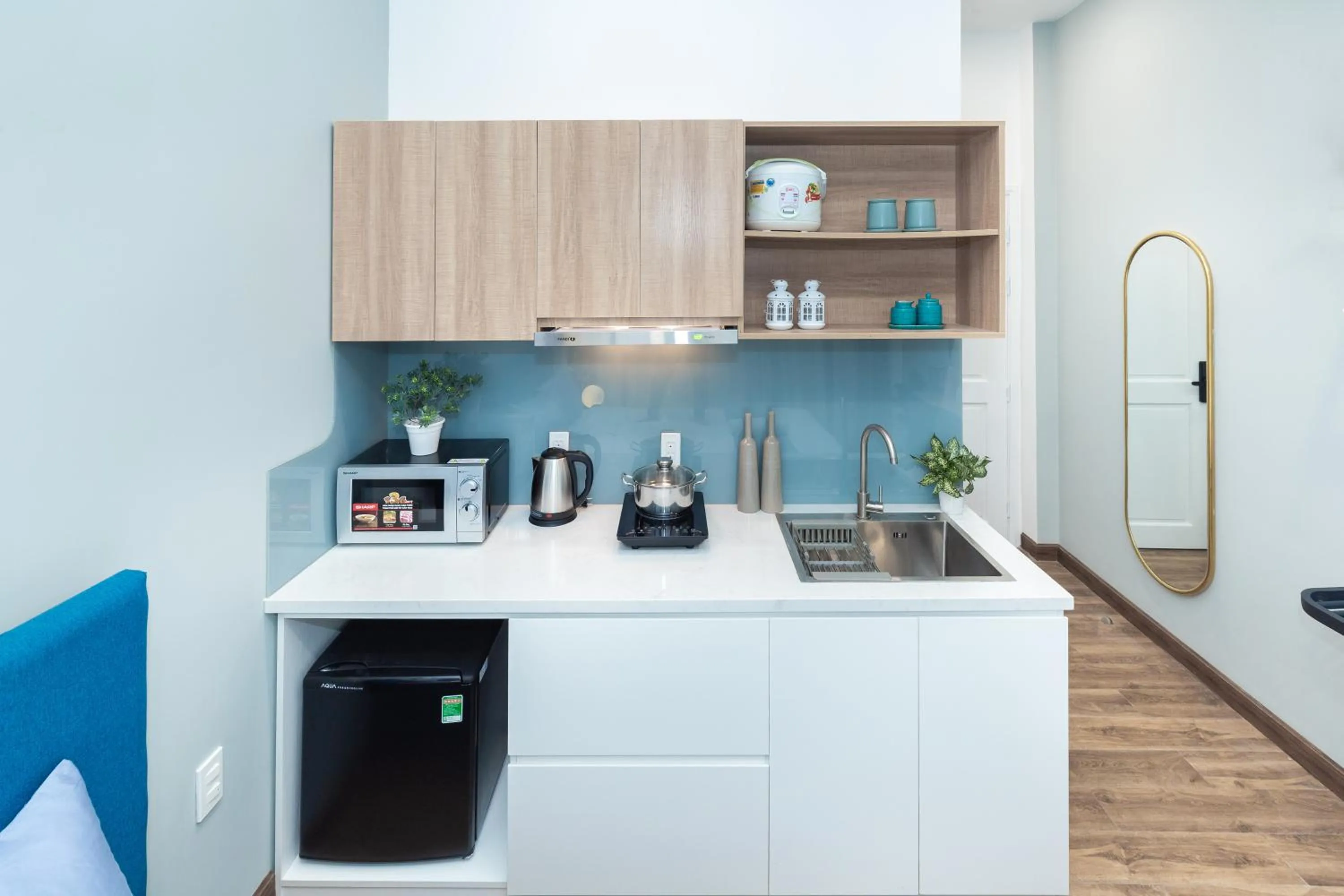 Kitchen or kitchenette in Cozrum Homes Greena House