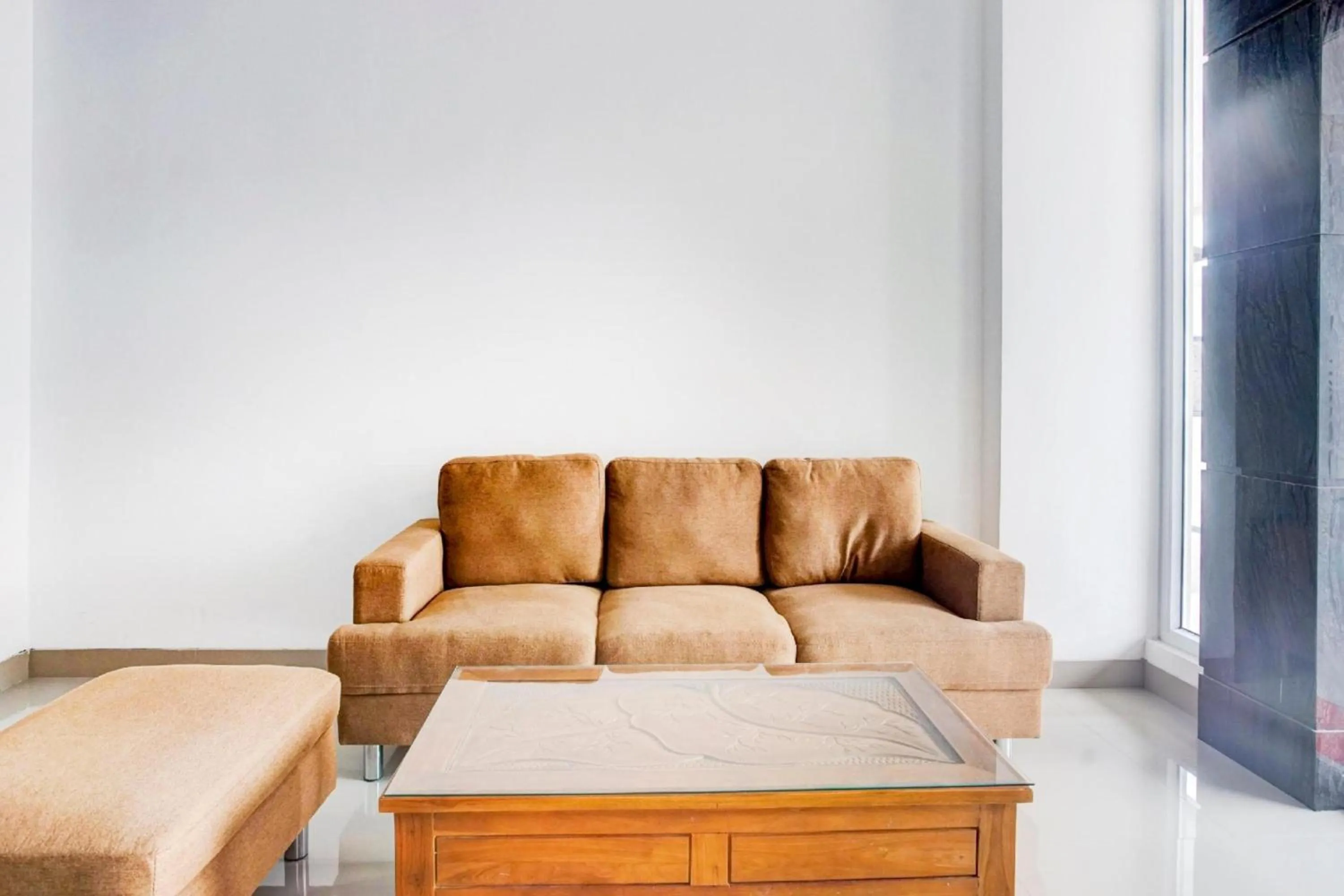 Seating area in Hotel O Sukarame Near Imanuel Hospital Way Halim Formerly Hotel Griya Bawean