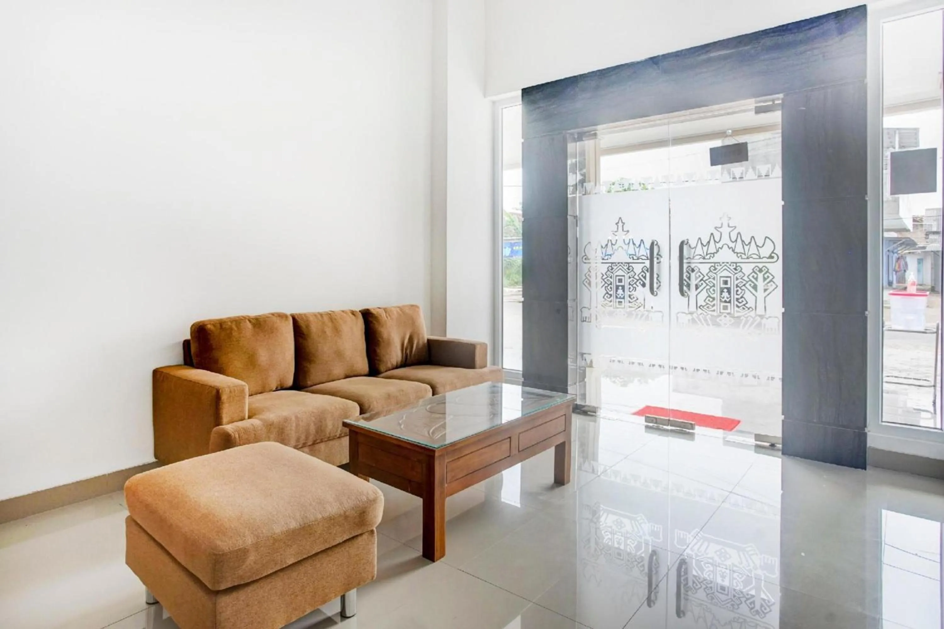 Seating area in Hotel O Sukarame Near Imanuel Hospital Way Halim Formerly Hotel Griya Bawean