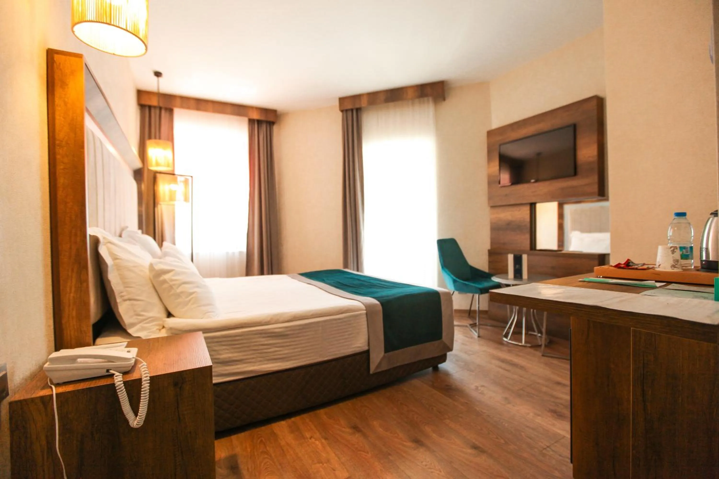 Bed in The Life Hotel & Spa