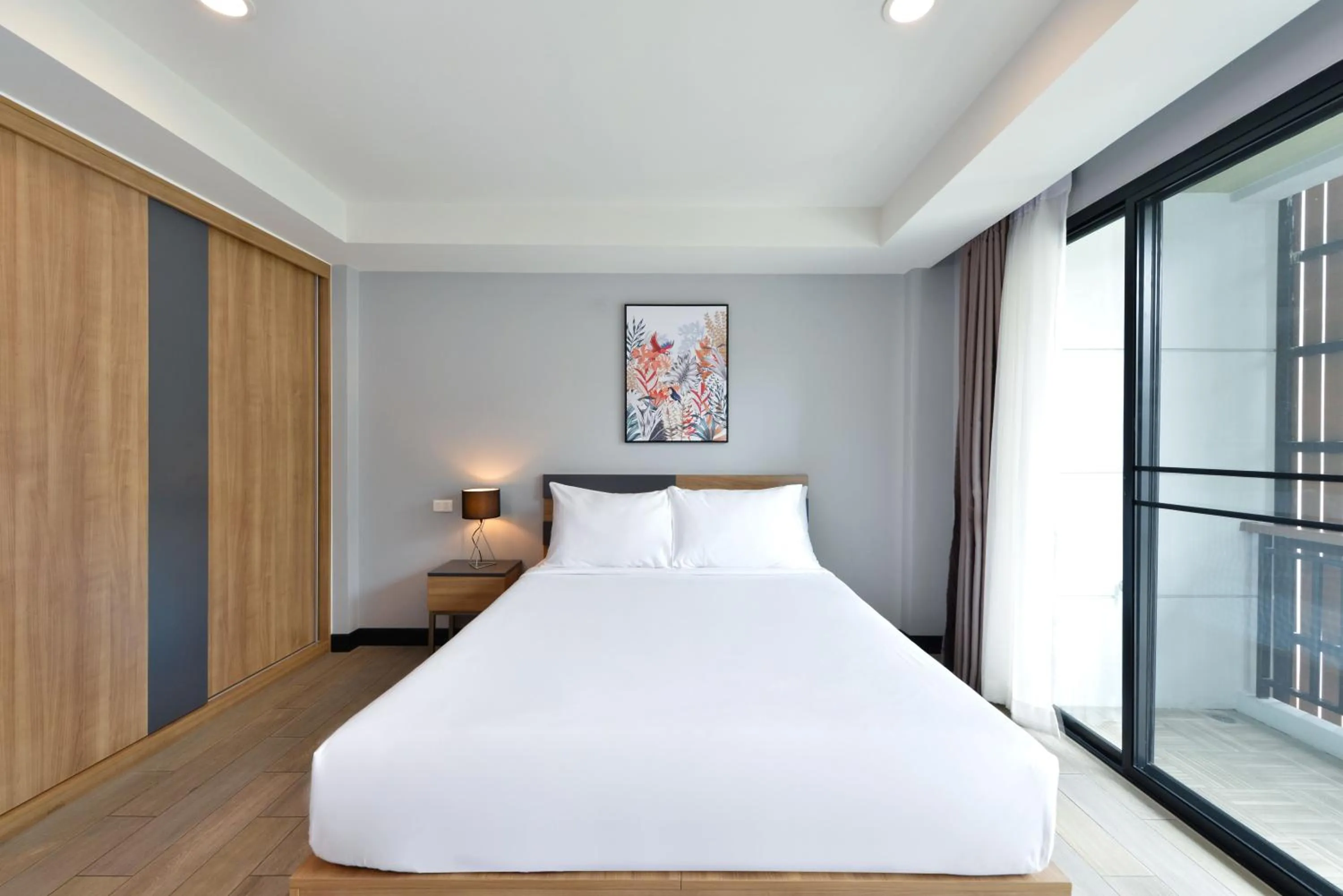 Bed in Raweewan Residence hotel