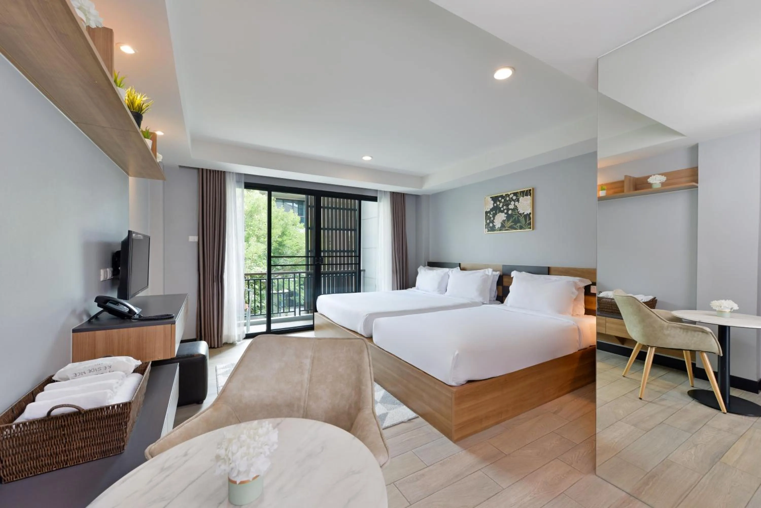 Bed in Raweewan Residence hotel