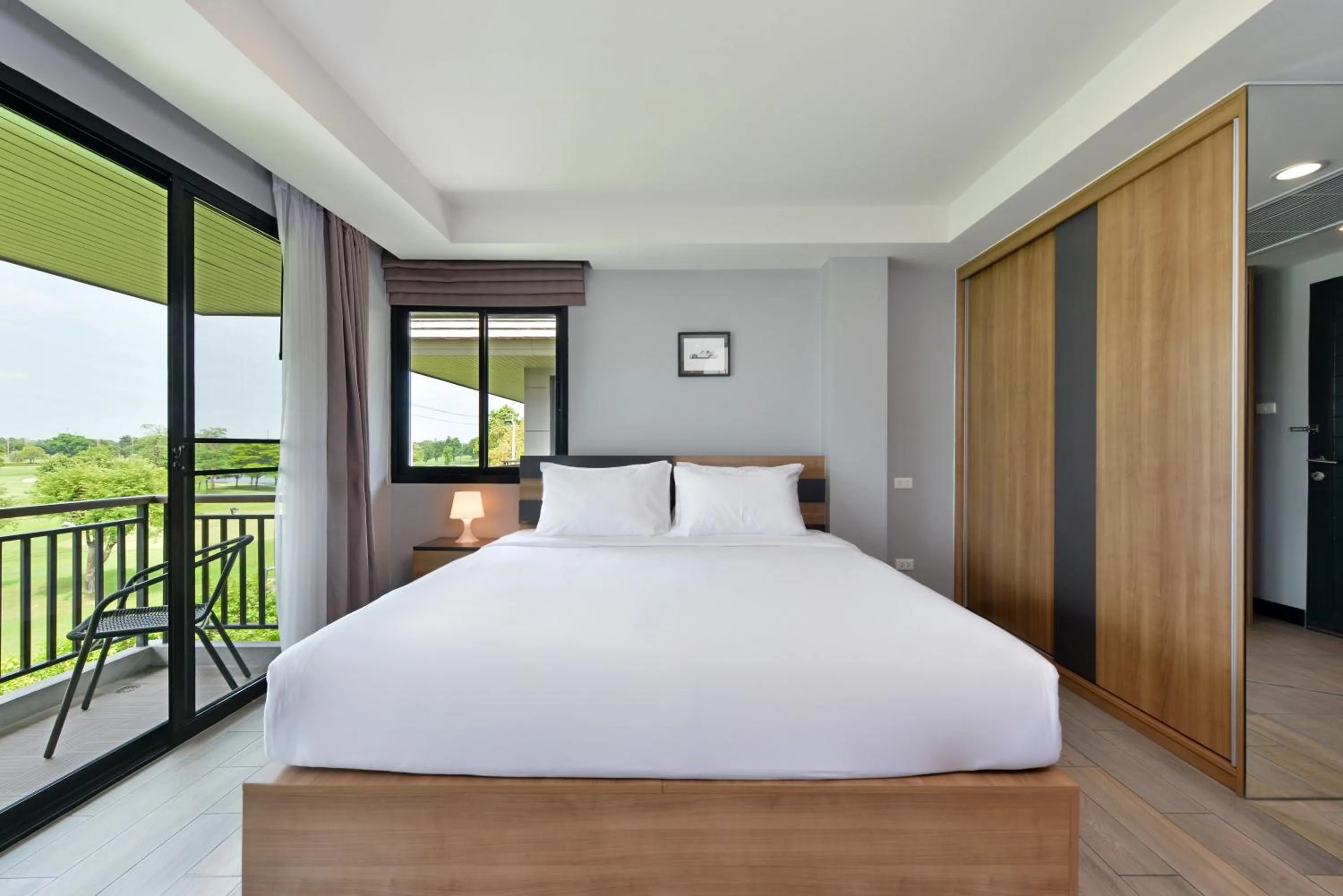 Bed in Raweewan Residence hotel