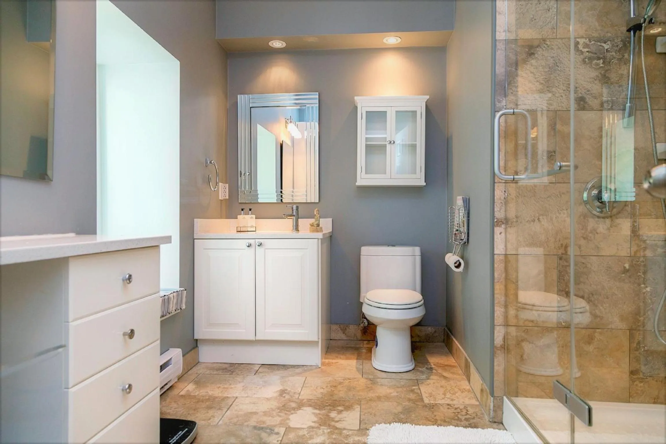 Shower in All Suites Whitney Manor