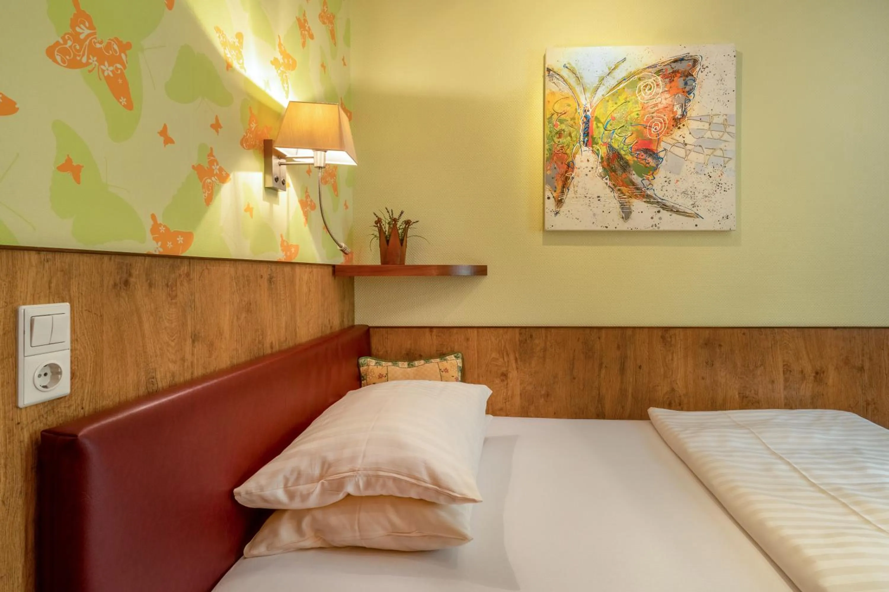 Bed in Hotel Arosa Düsseldorf Oberkassel