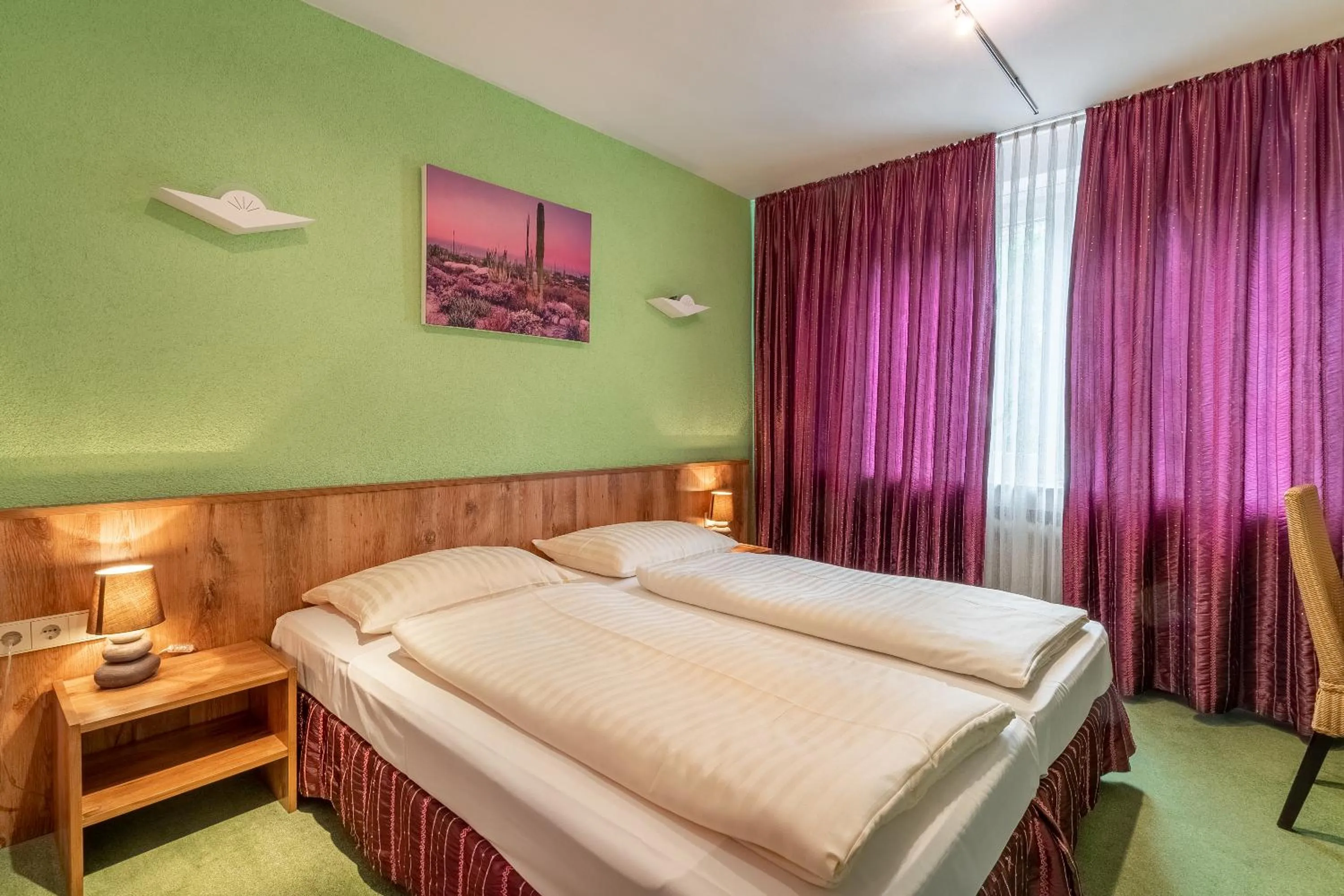 Bed in Hotel Arosa Düsseldorf Oberkassel