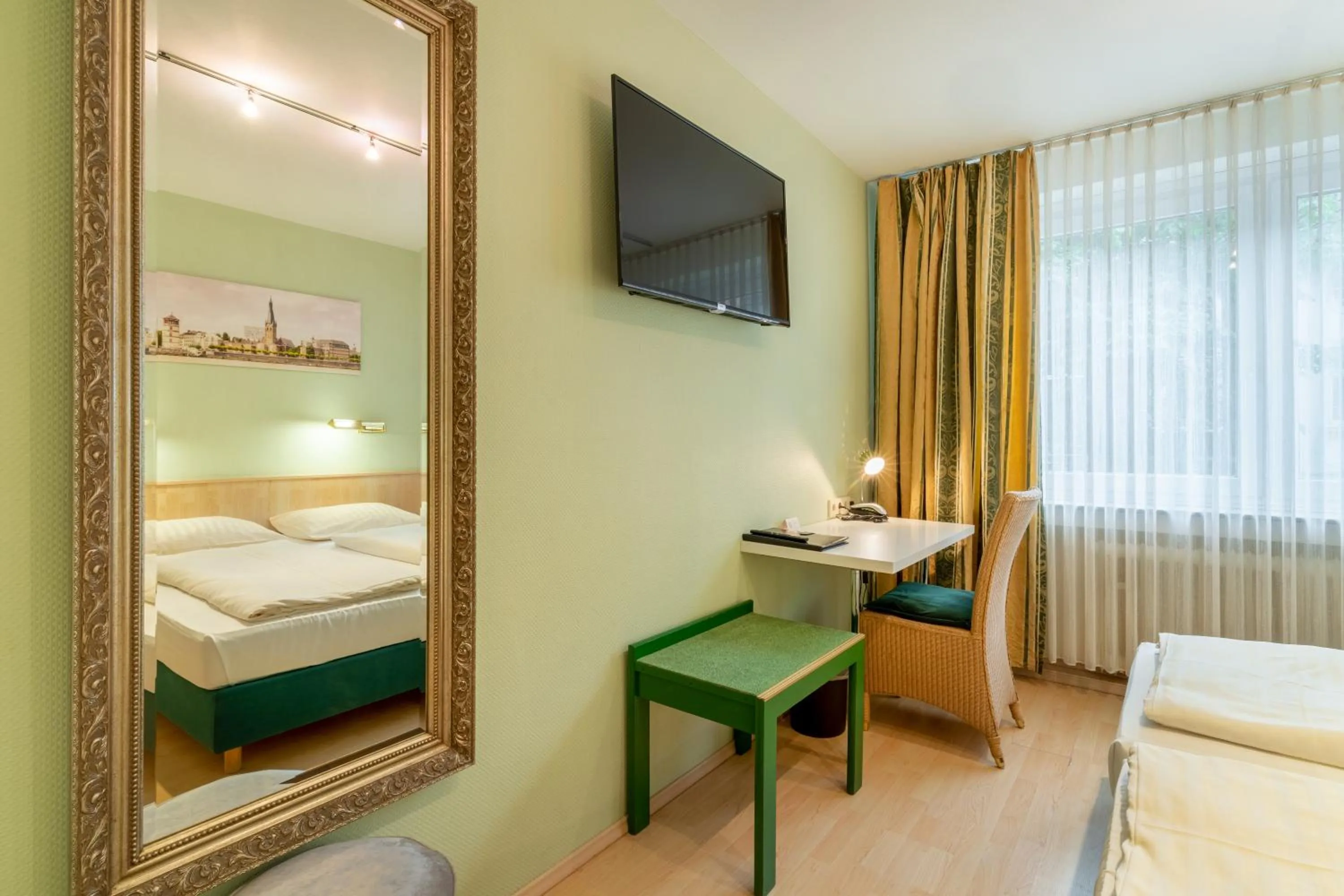 Bed in Hotel Arosa Düsseldorf Oberkassel