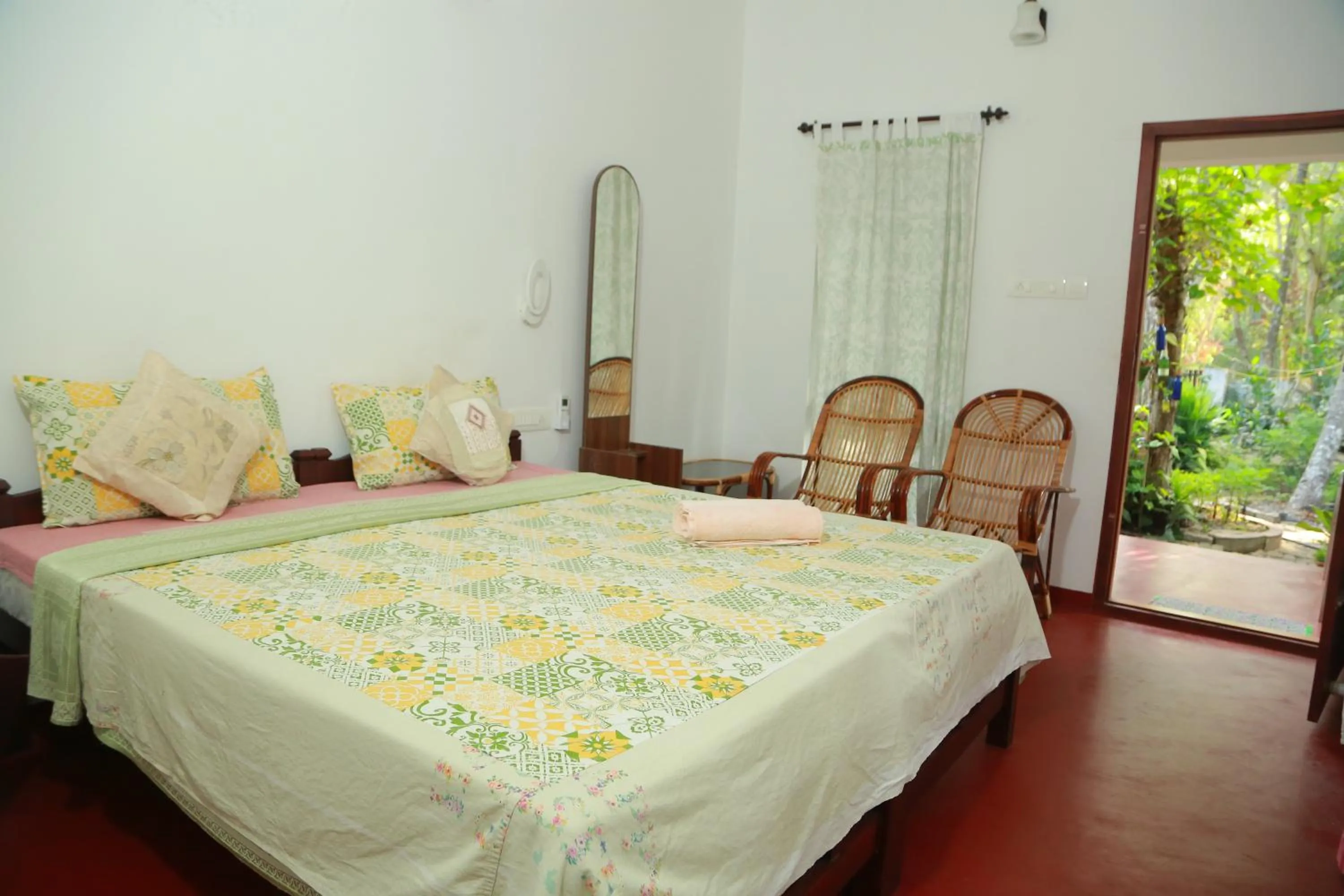Bed in Marari Charlys Homestay