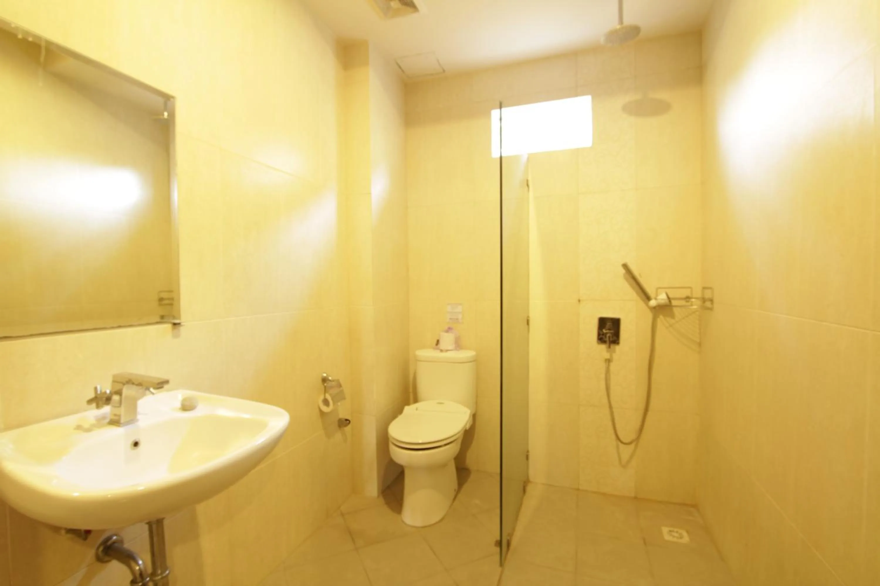 Bathroom in Alit Beach Resort and Villas