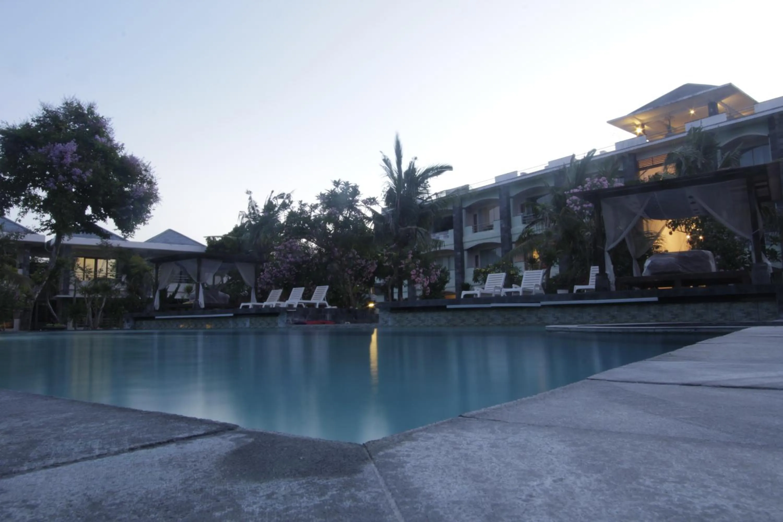 Swimming pool in Alit Beach Resort and Villas