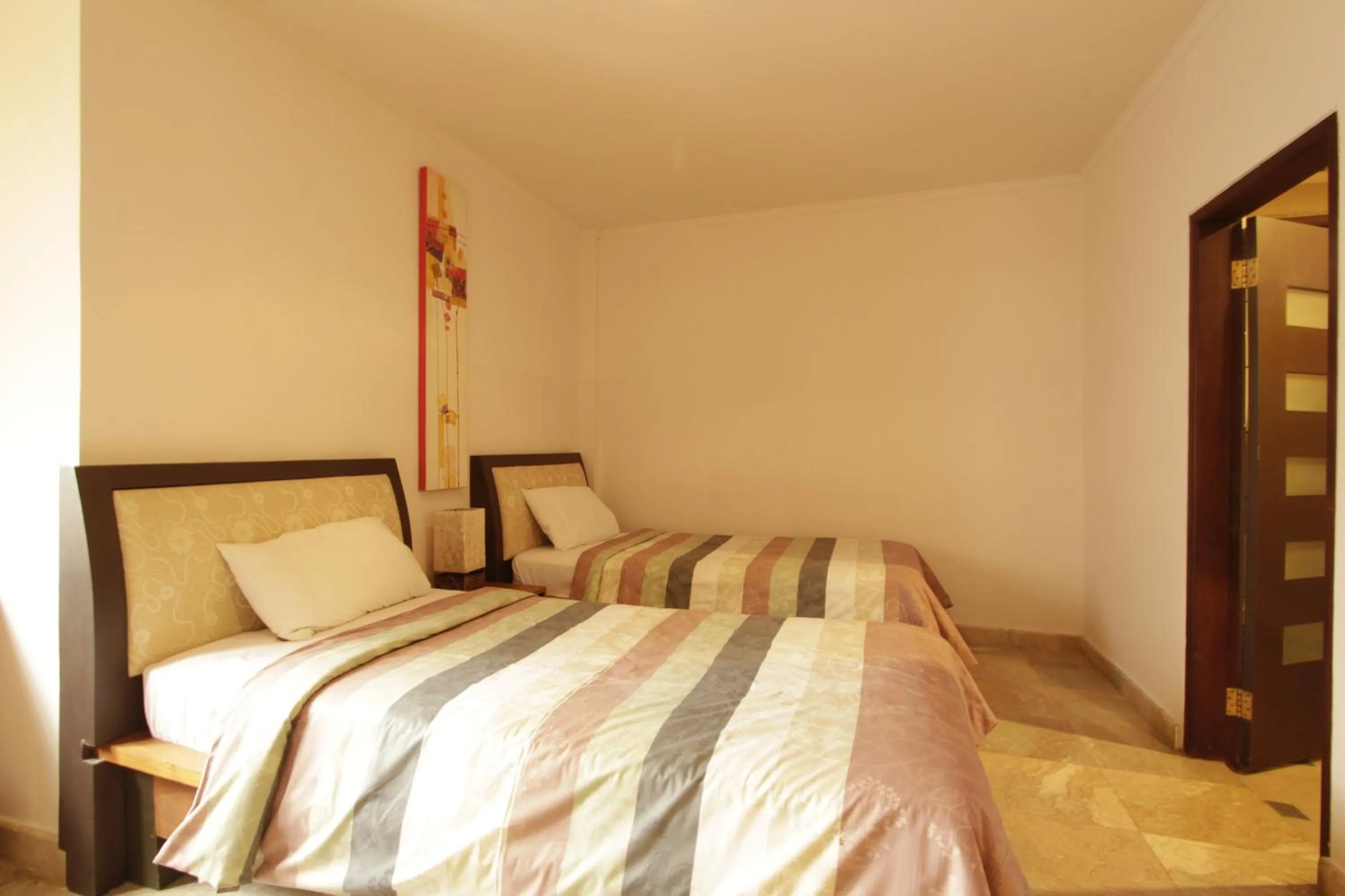 Bedroom, Bed in Alit Beach Resort and Villas