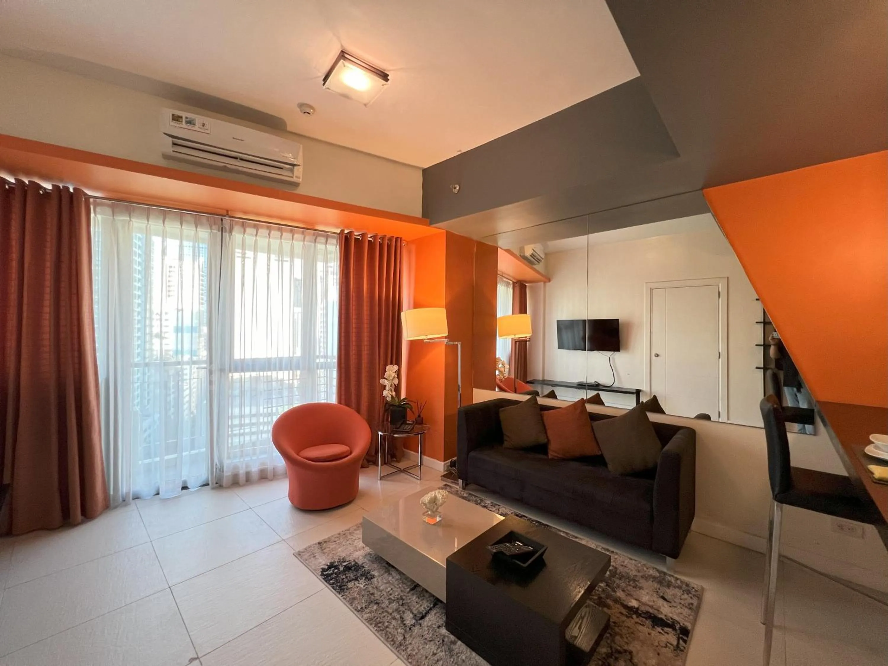 Communal lounge/ TV room in KL Serviced Residences Managed by HII