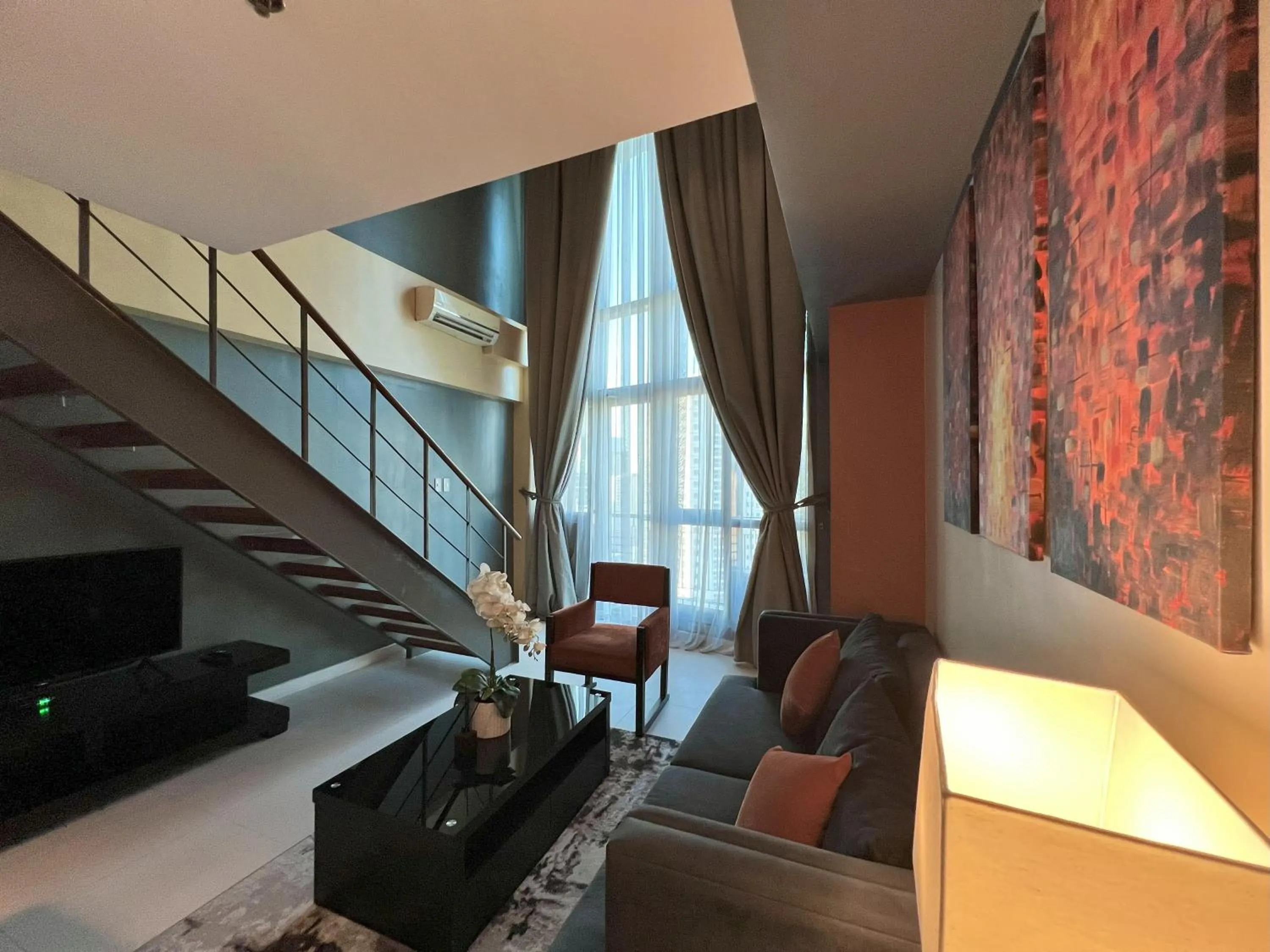 Communal lounge/ TV room in KL Serviced Residences Managed by HII