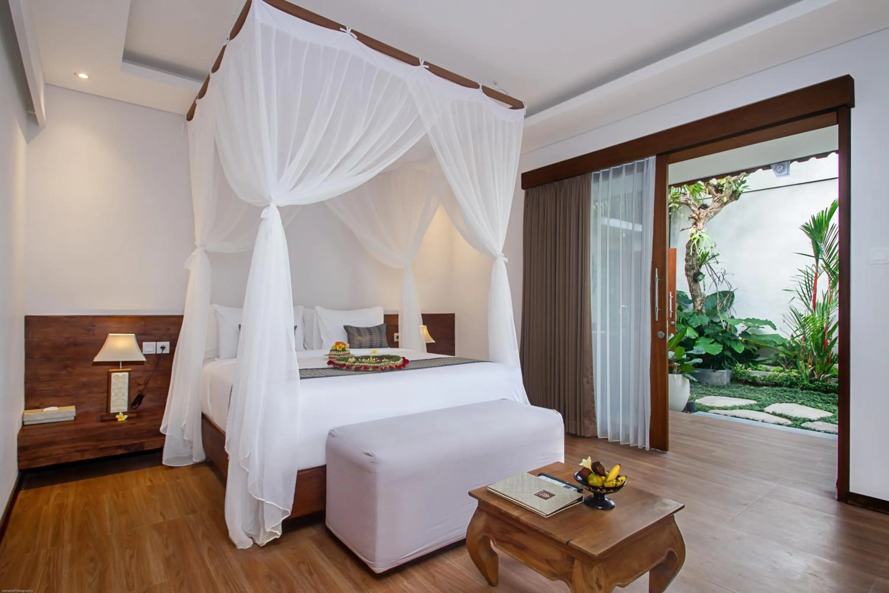 Garden view, Bed in Reswaha Villas by GenuineHost