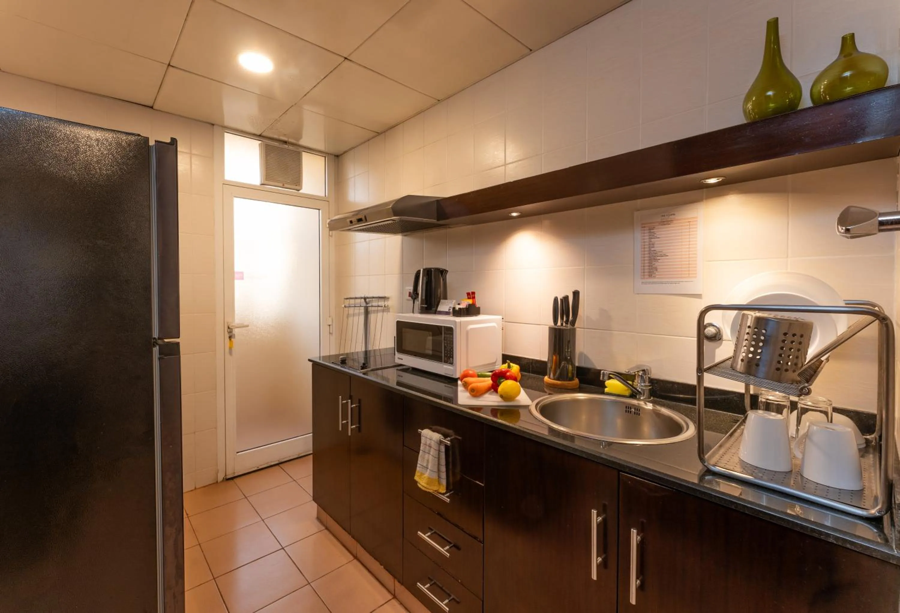 Kitchen or kitchenette in The Eclipse Boutique Suites