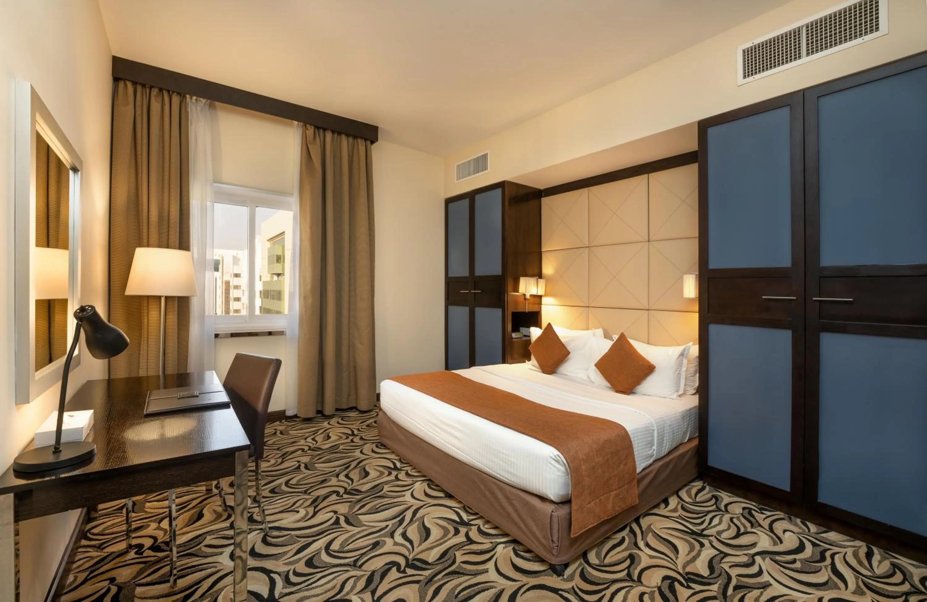 Bed in The Eclipse Boutique Suites