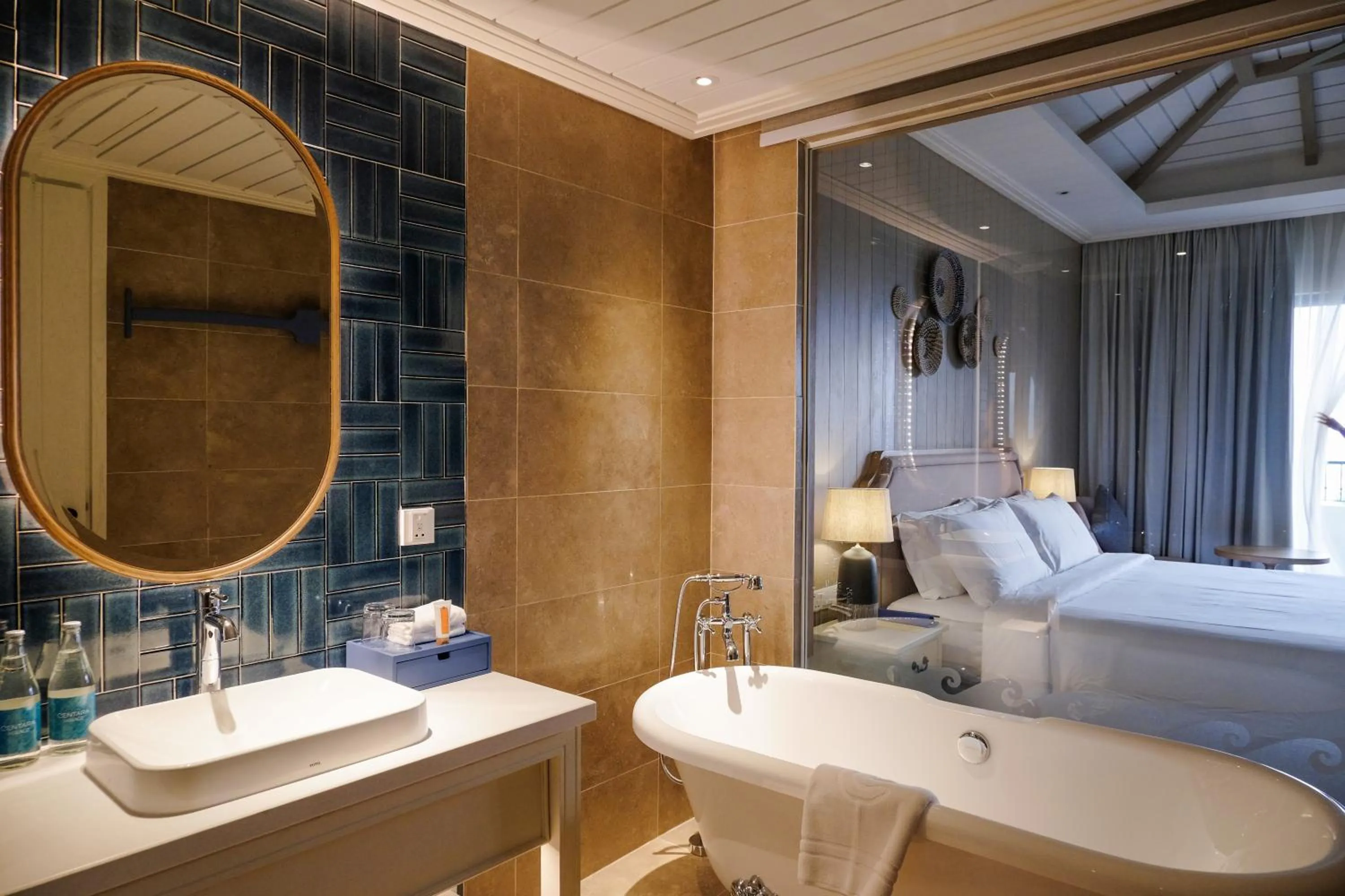 Bathroom, Bed in Centara Mirage Resort Mui Ne