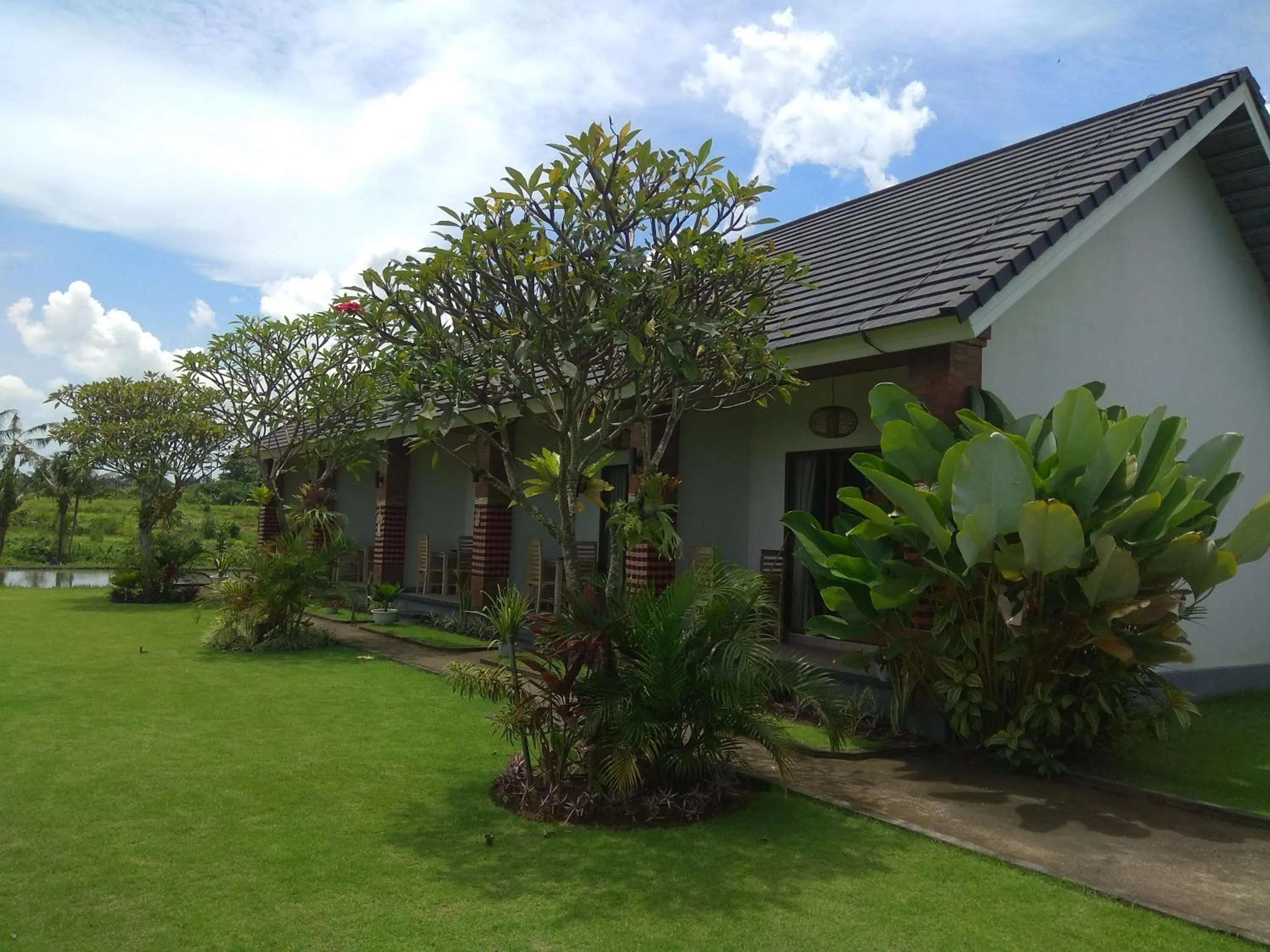 Property building in Tamiu Guesthouse at Desa Wisata Keramas Near Keramas Surf Beach