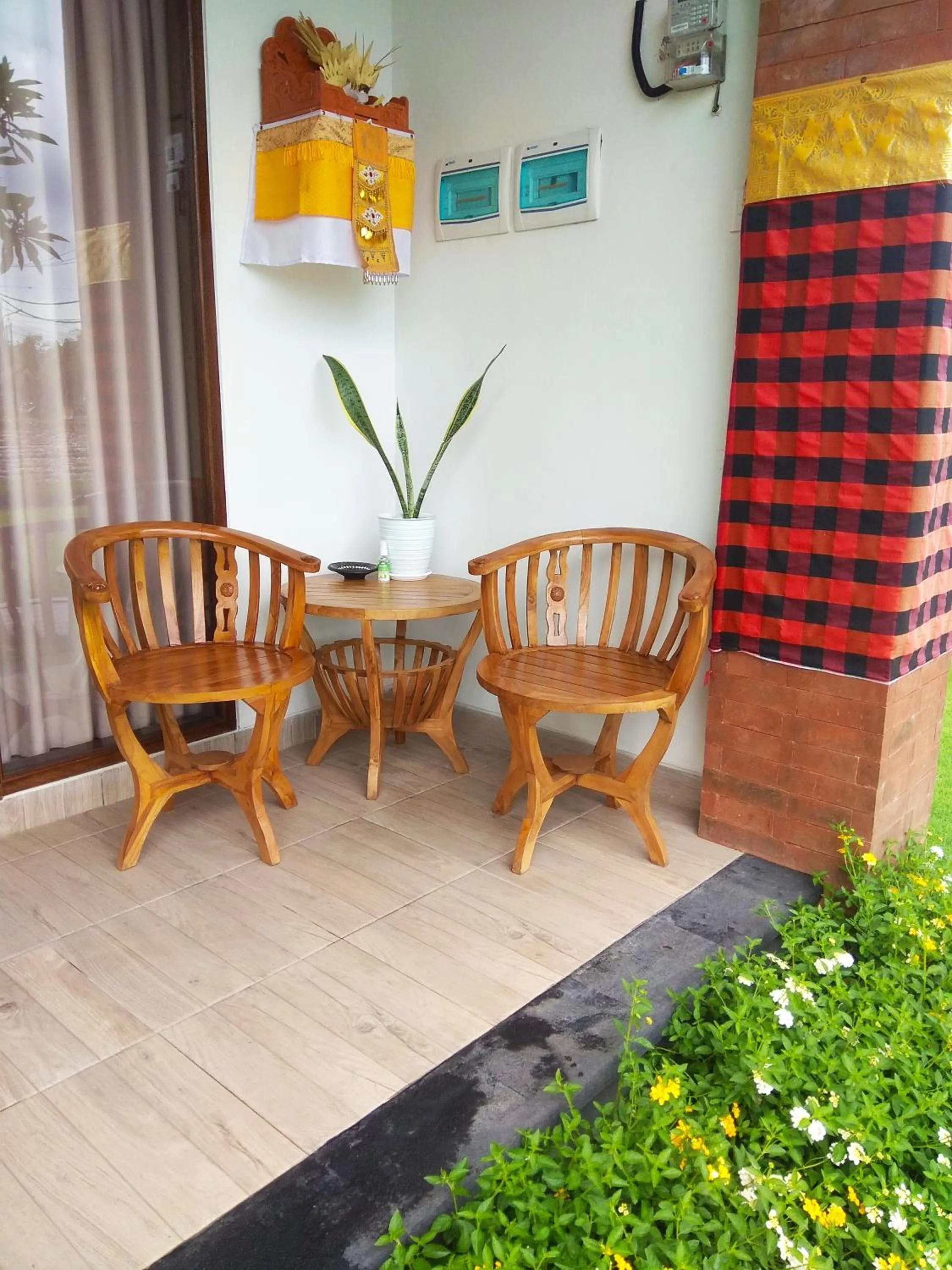 Balcony/Terrace in Tamiu Guesthouse at Desa Wisata Keramas Near Keramas Surf Beach