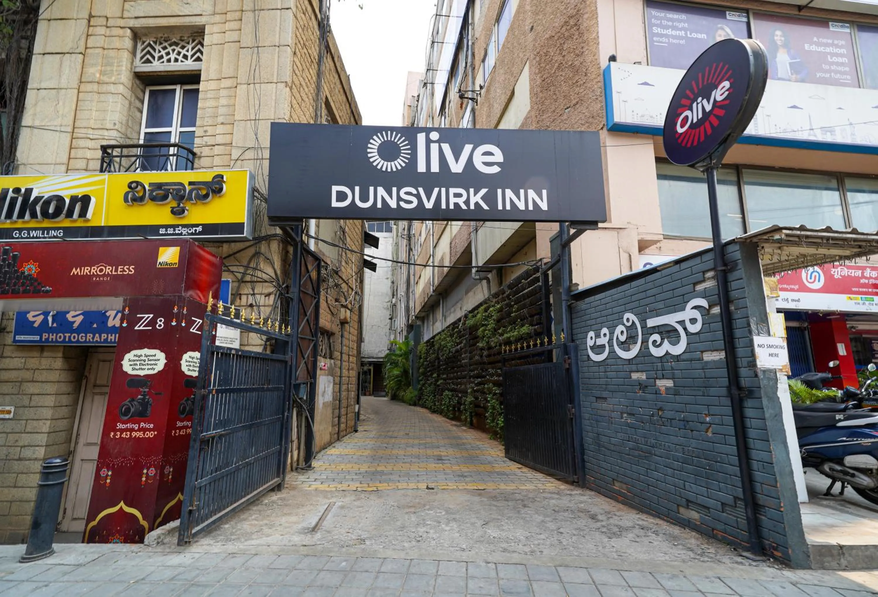 Property logo or sign in Olive Hotel MG Road Dunsvirk Inn by Embassy Group