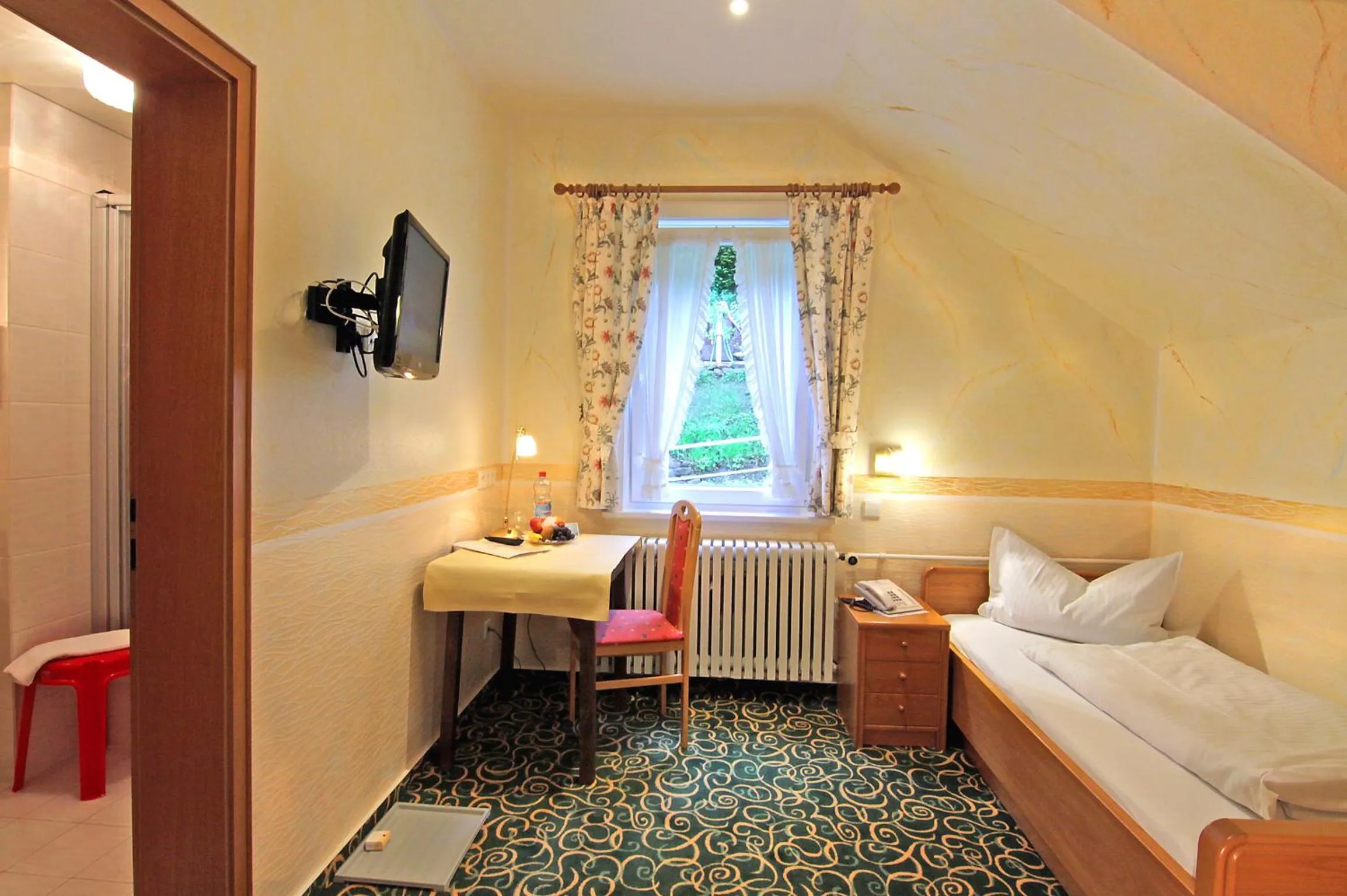 Photo of the whole room, Bed in Hotel Weingärtner