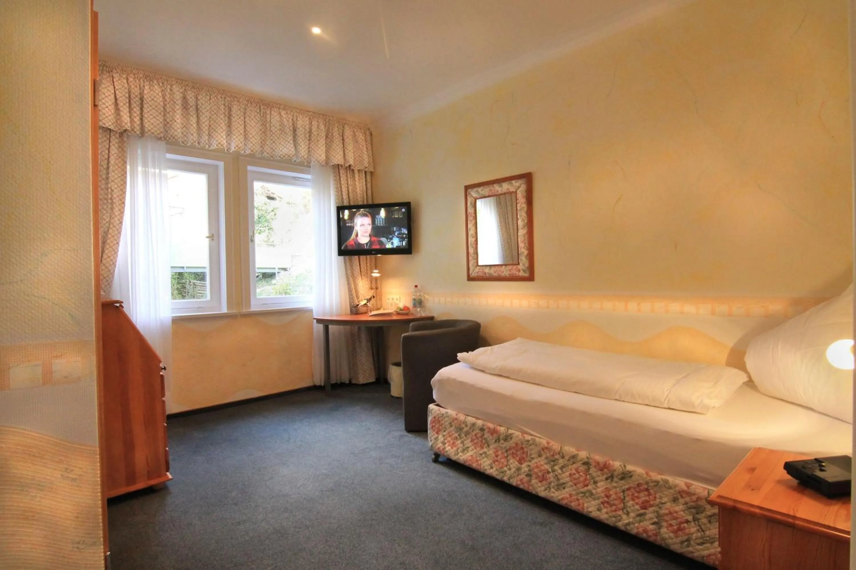 Photo of the whole room, Bed in Hotel Weingärtner