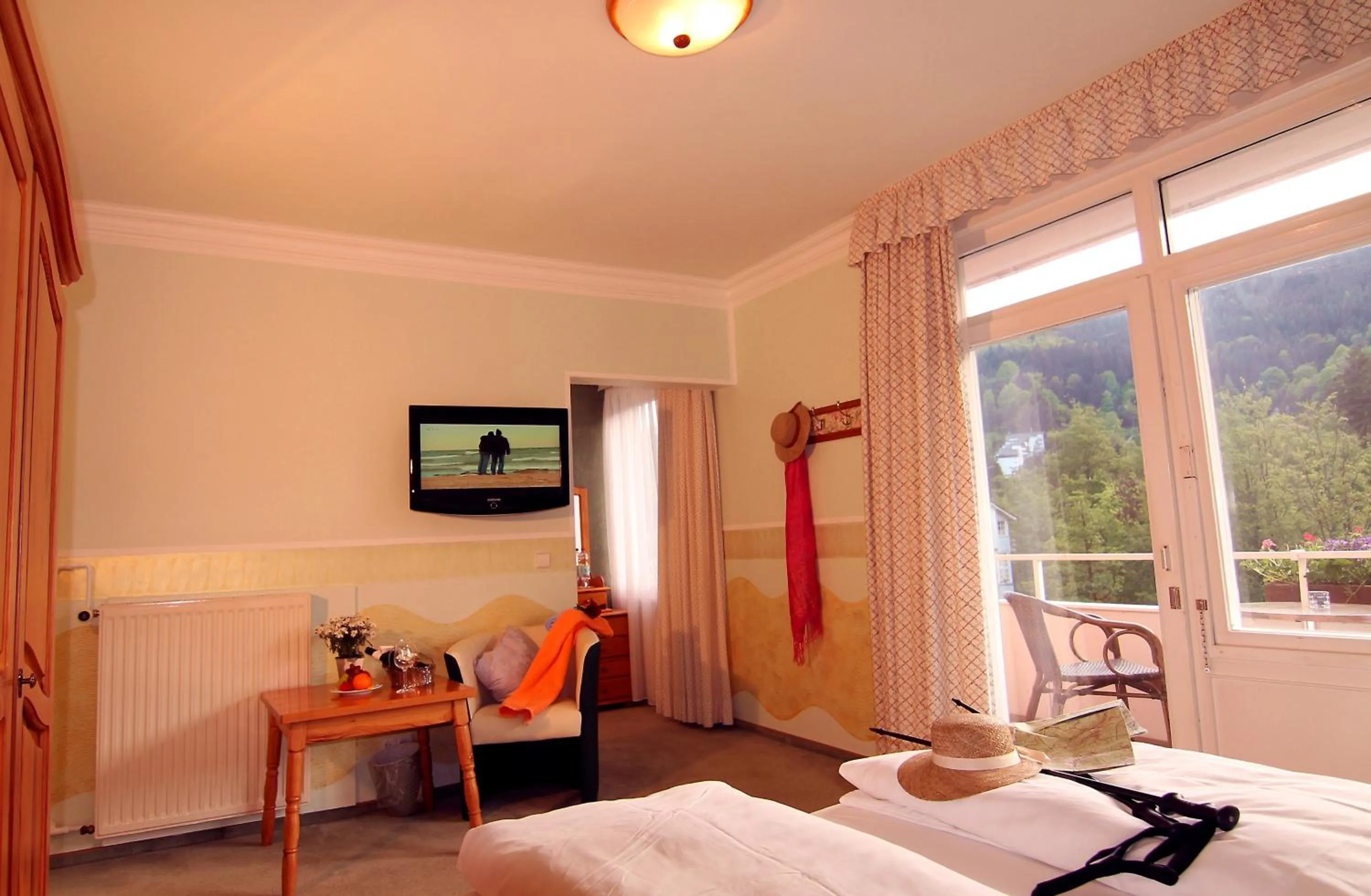 Seating area, Bed in Hotel Weingärtner