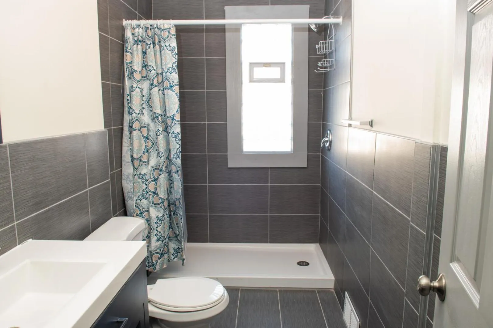 Bathroom in The Eastside Manor- With Private Yard & Free Parking, Minutes From Falls & Casino by Niagara Hospitality