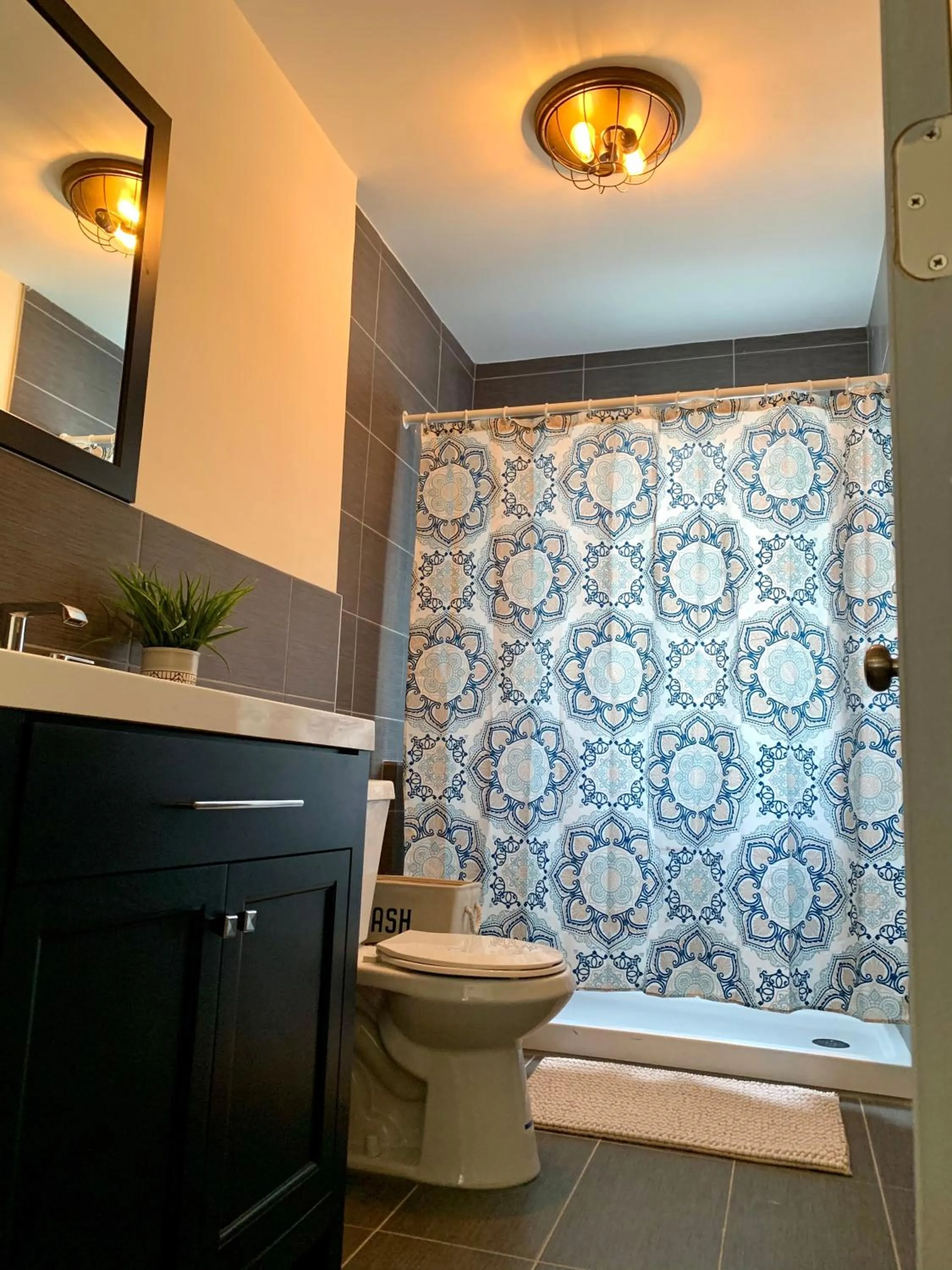 Bathroom in The Eastside Manor- With Private Yard & Free Parking, Minutes From Falls & Casino by Niagara Hospitality