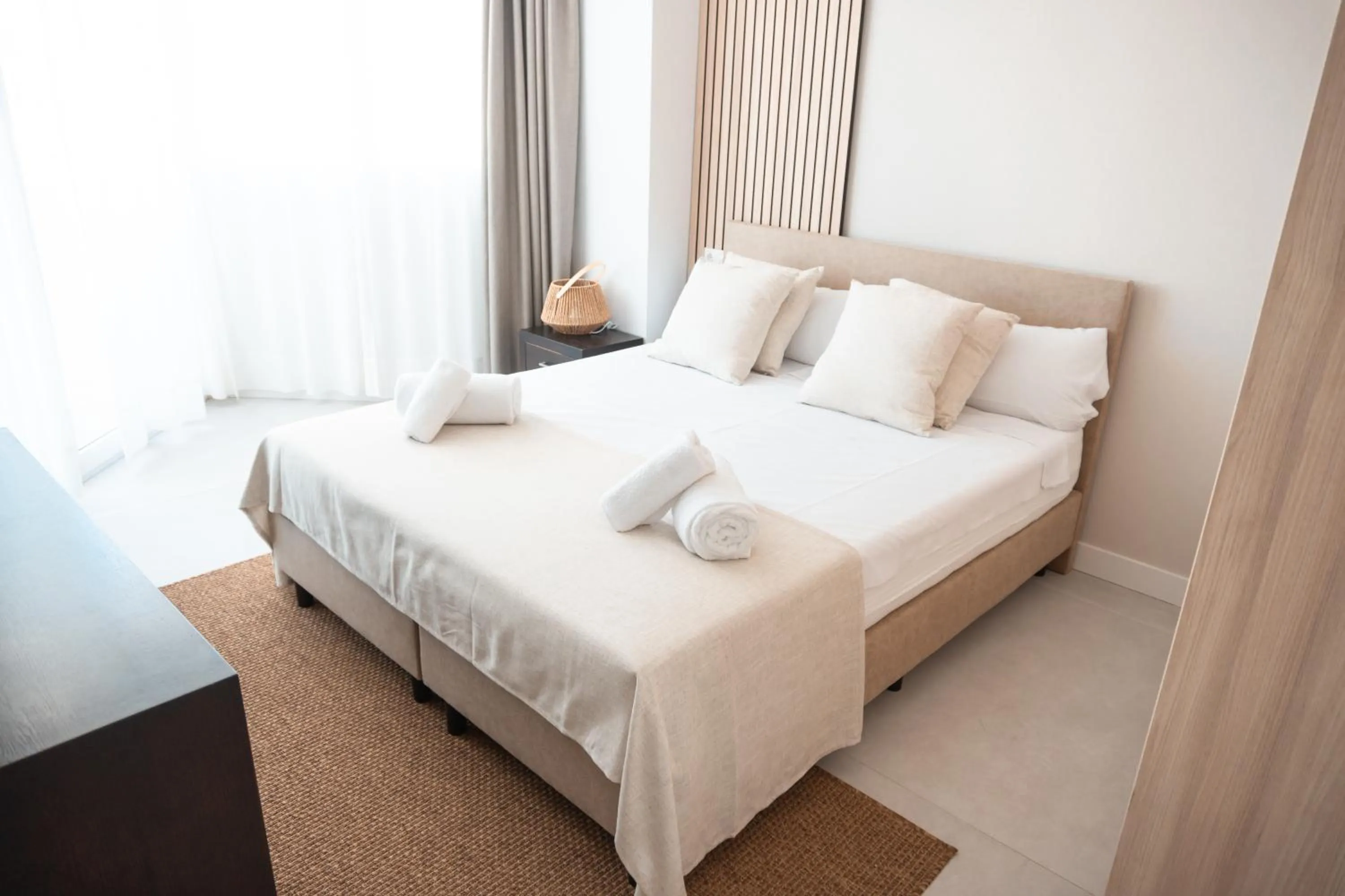 Bed in Portomar Apartments - 4-Star Superior Hotel