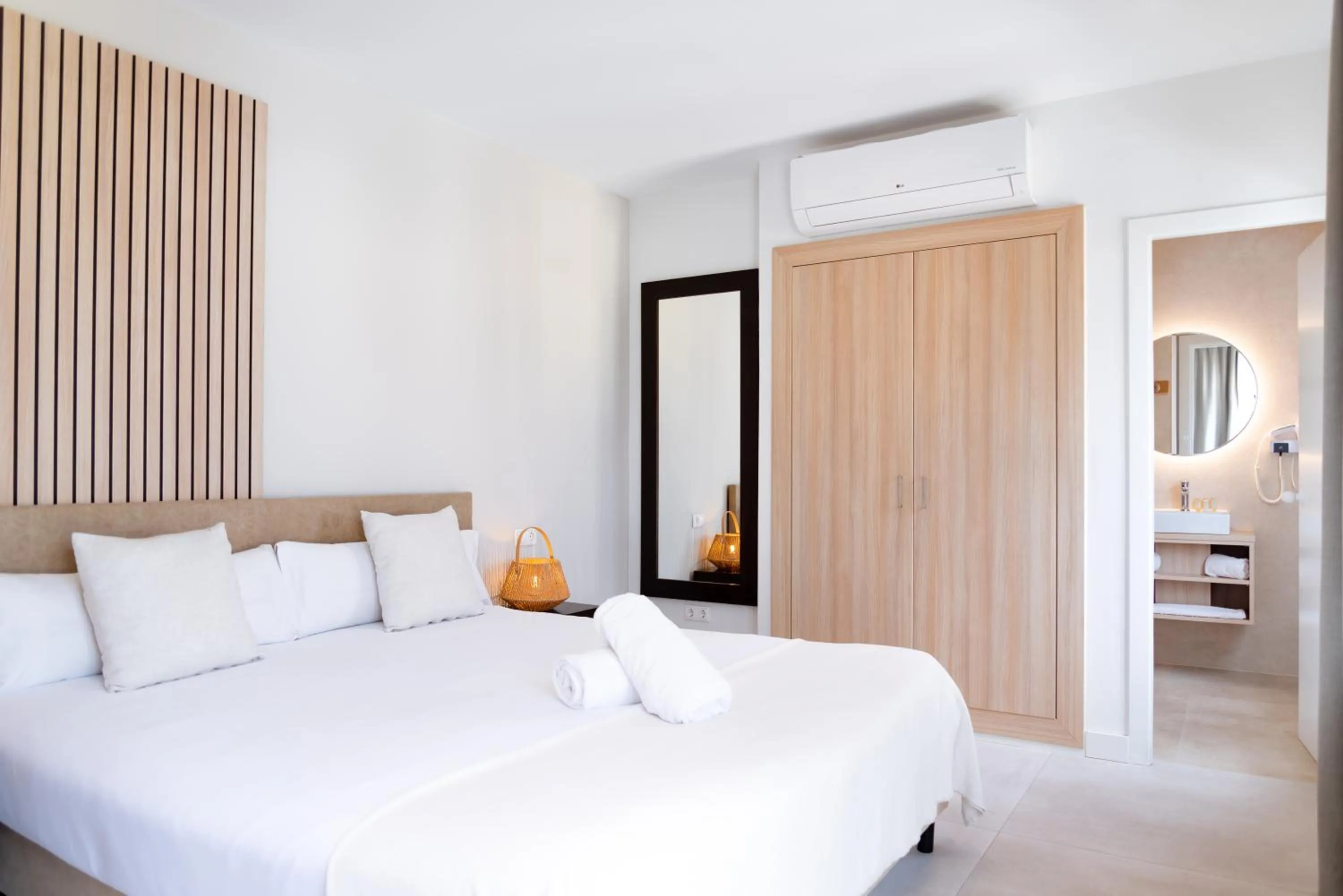 Bed in Portomar Apartments - 4-Star Superior Hotel