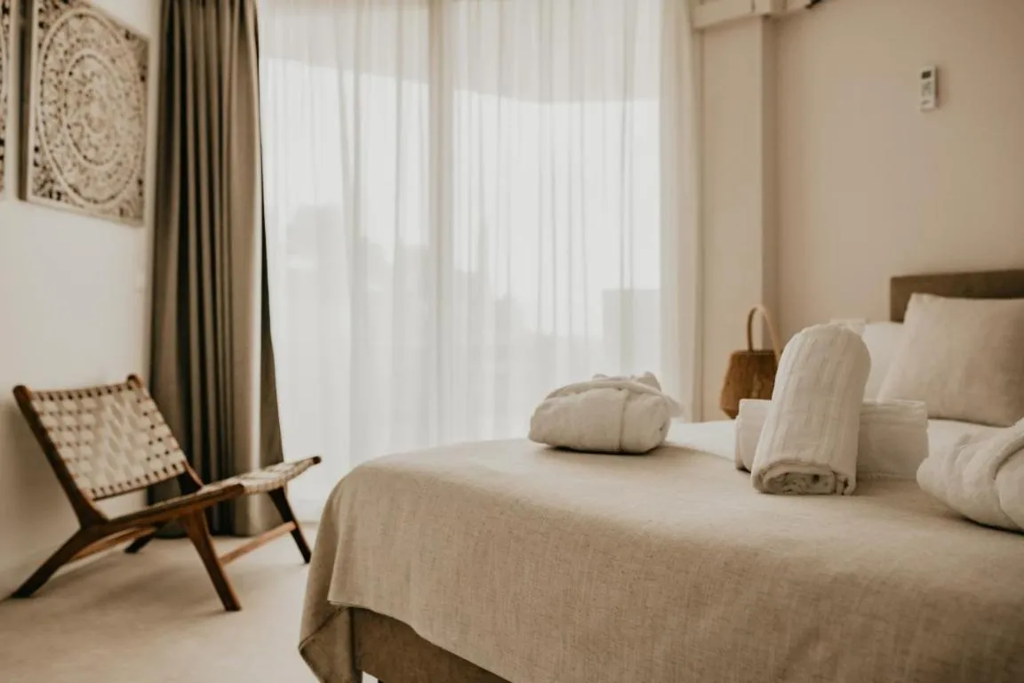 Bed in Portomar Apartments - 4-Star Superior Hotel